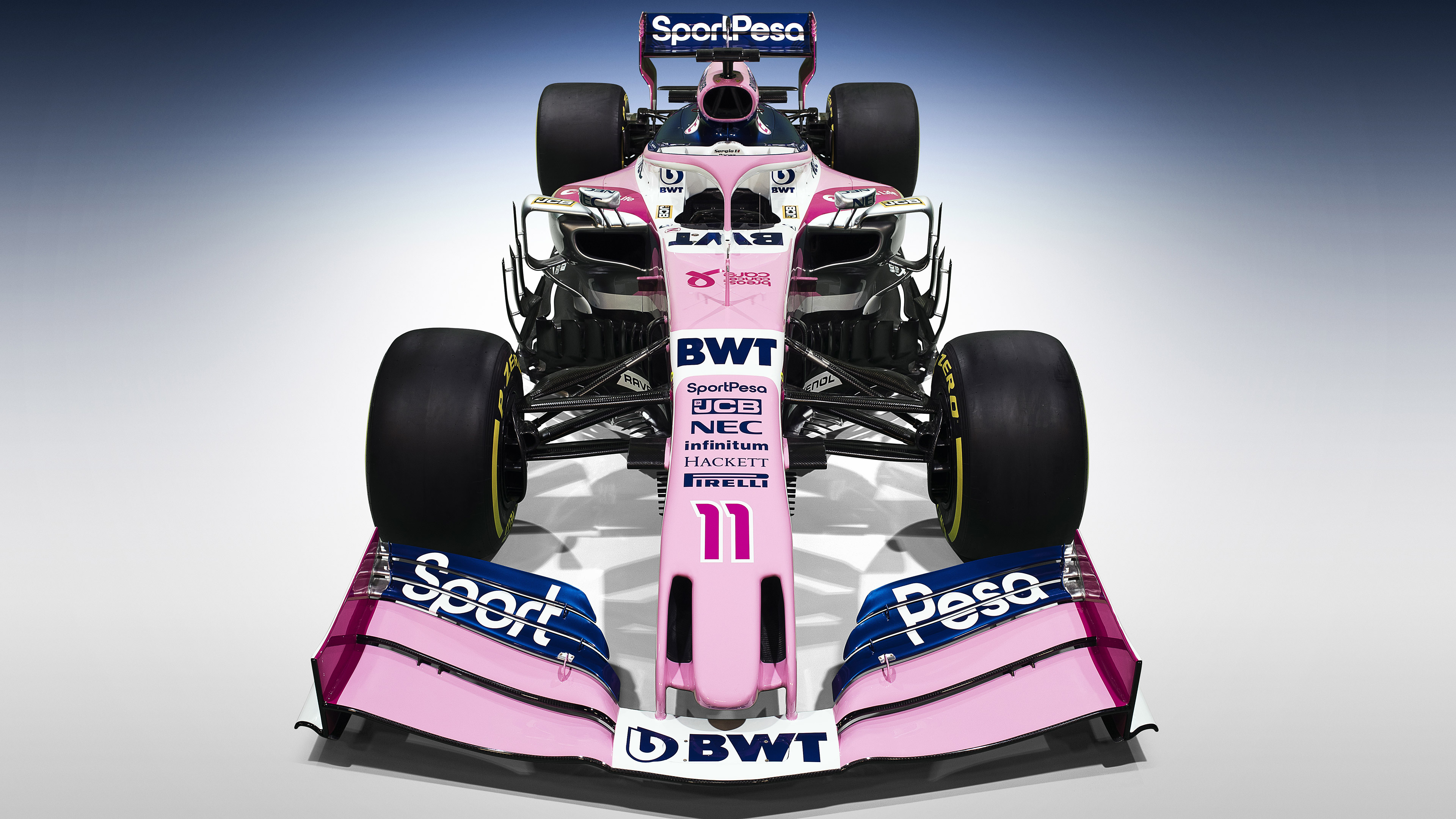 Formula 1 Car with Pink and Blue Livery HD Wallpaper