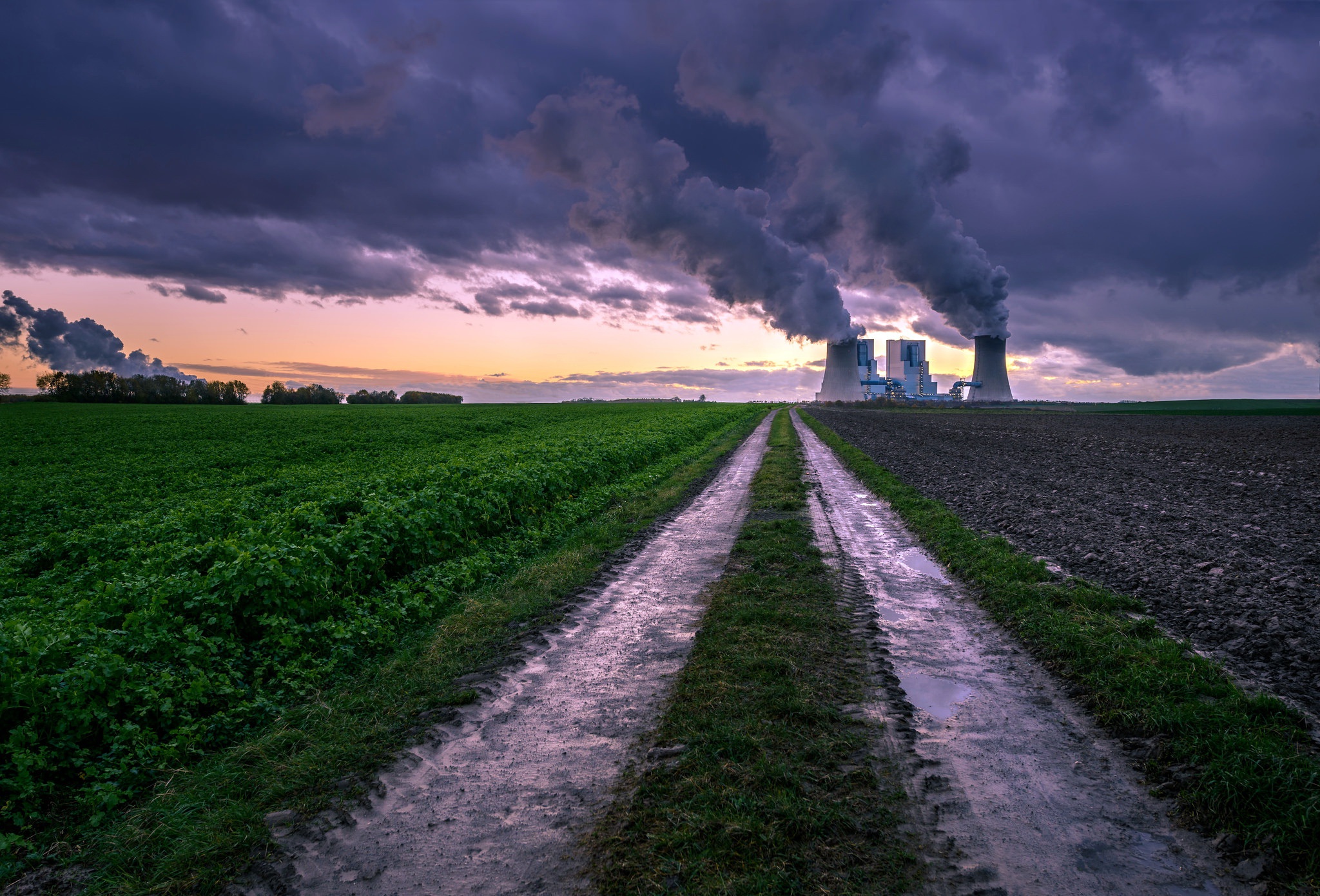 Power Plant Emitting Smoke at Sunset HD Wallpaper