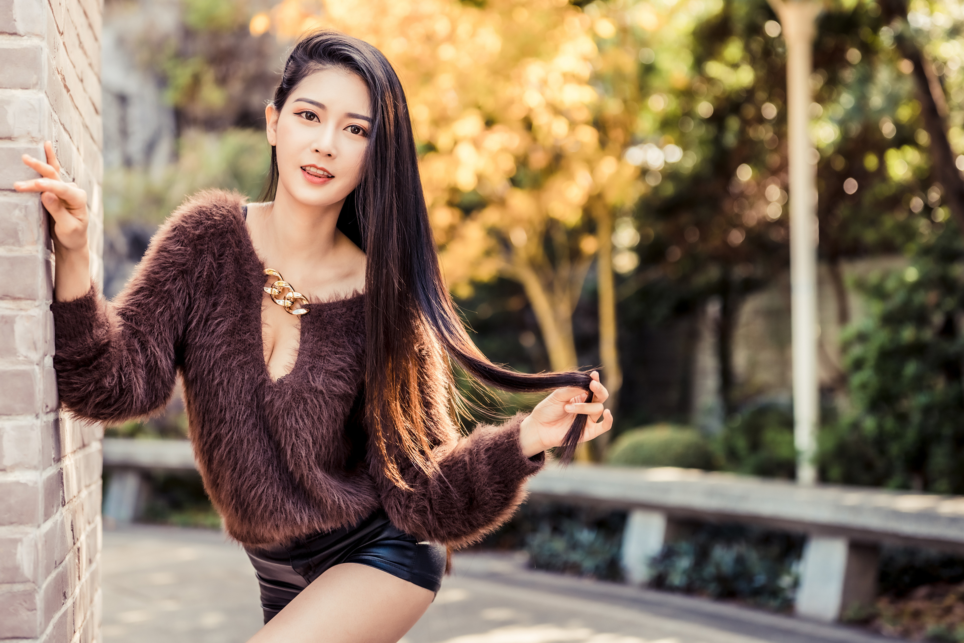 Asian woman with long hair wearing a brown sweater HD Wallpaper