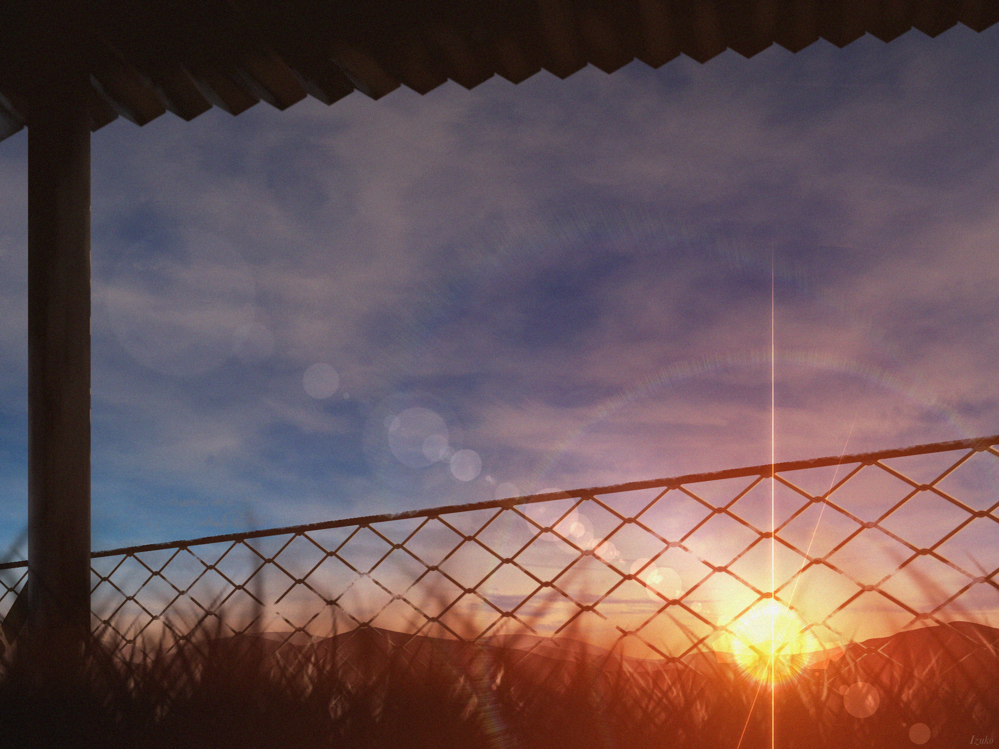 Sunset viewed through a chain-link fence HD Wallpaper