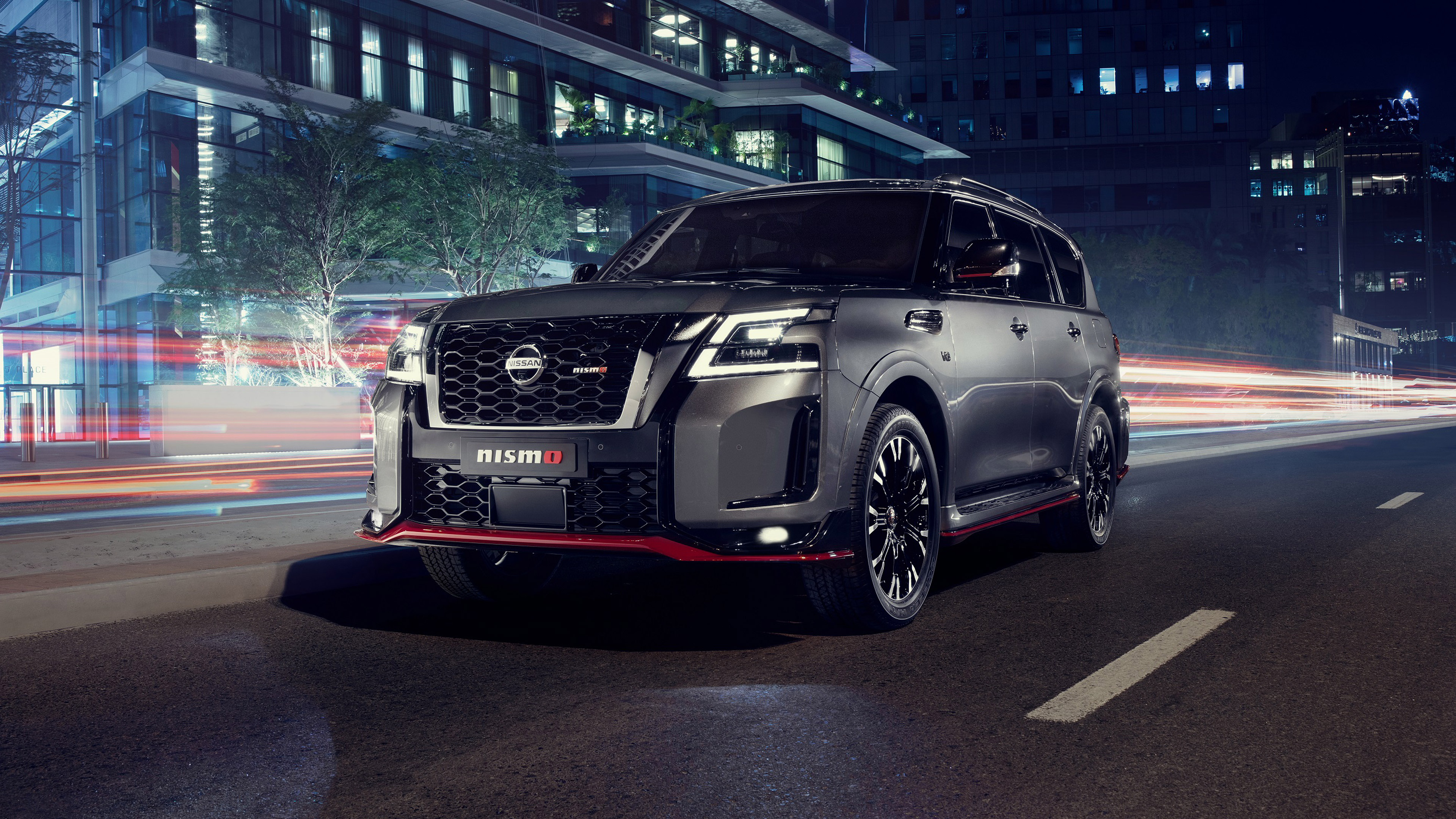 Nissan Patrol Nismo SUV on a City Street at Night HD Wallpaper