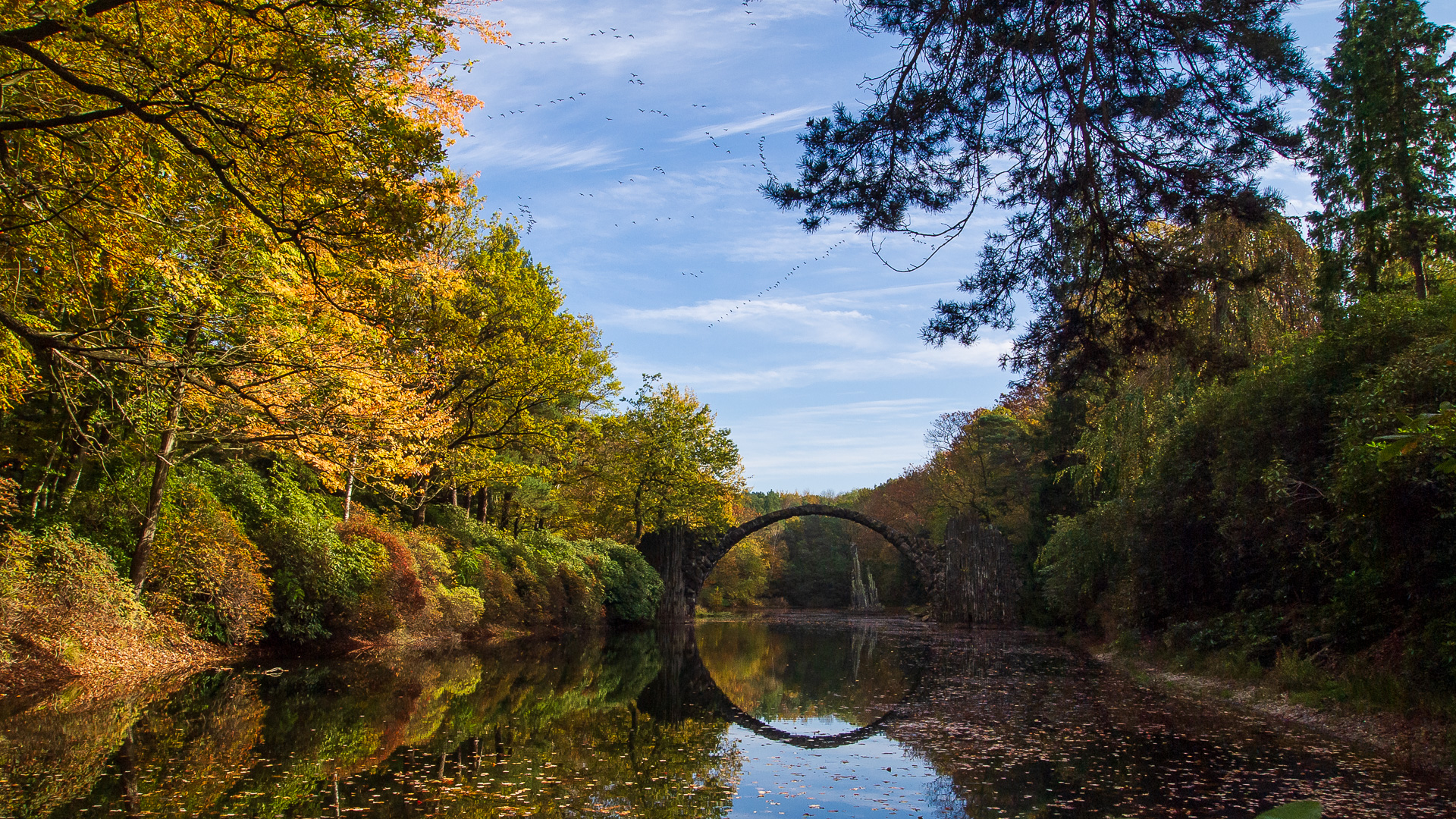 Rakotzbrücke bridge in autumn with reflection HD Wallpaper