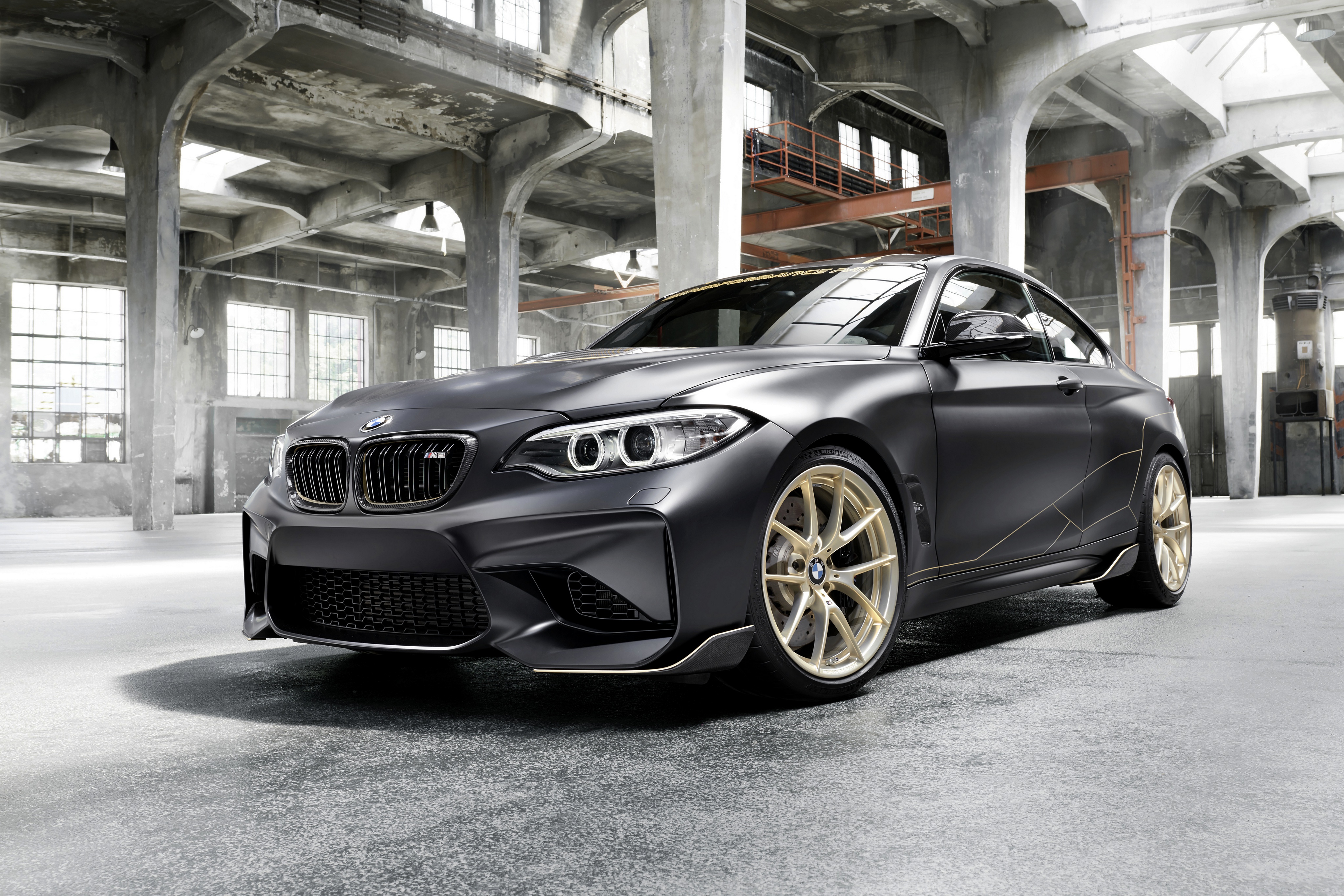 Matte Black BMW M2 4K in Industrial Warehouse HD Wallpaper