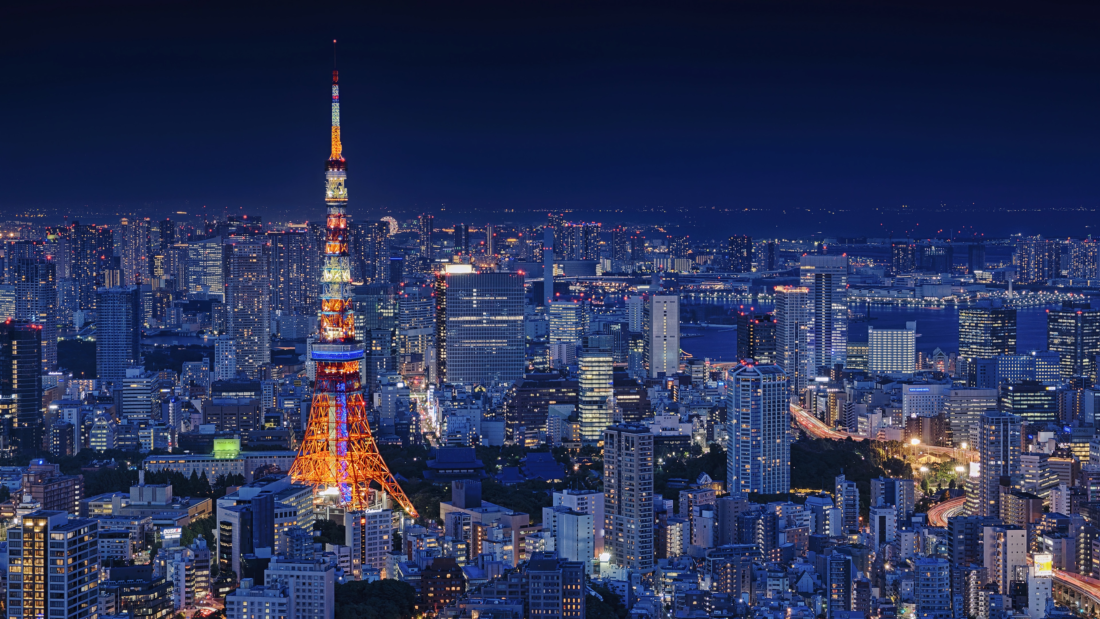 Tokyo Tower at Night in a Cityscape 4K HD Wallpaper