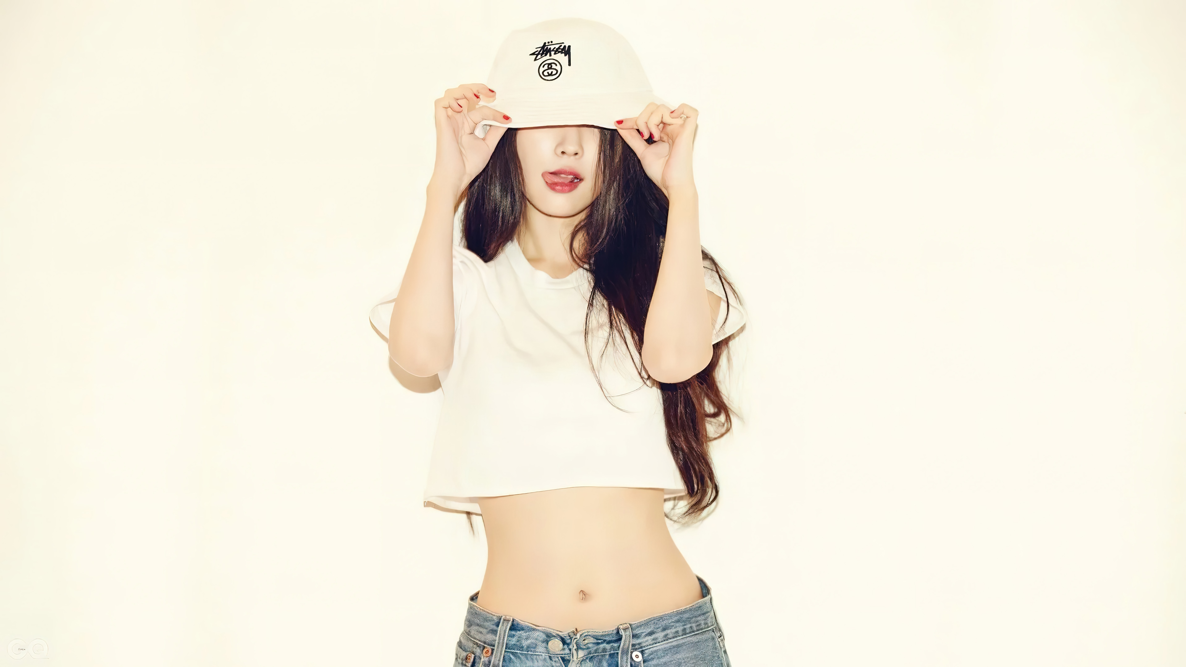 IU wearing a bucket hat and crop top HD Wallpaper