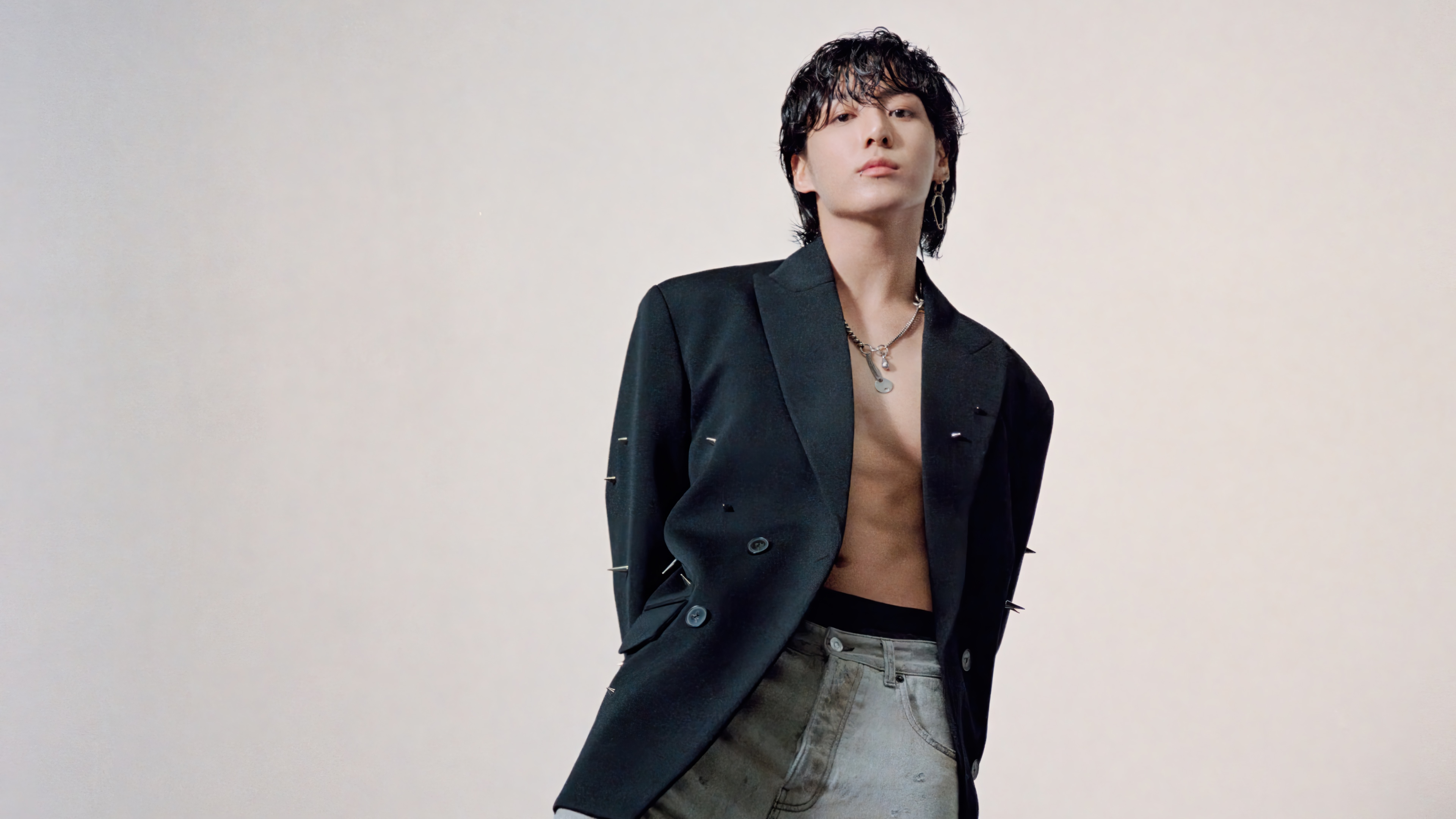 Jungkook in a black blazer and jeans 4K HD Wallpaper