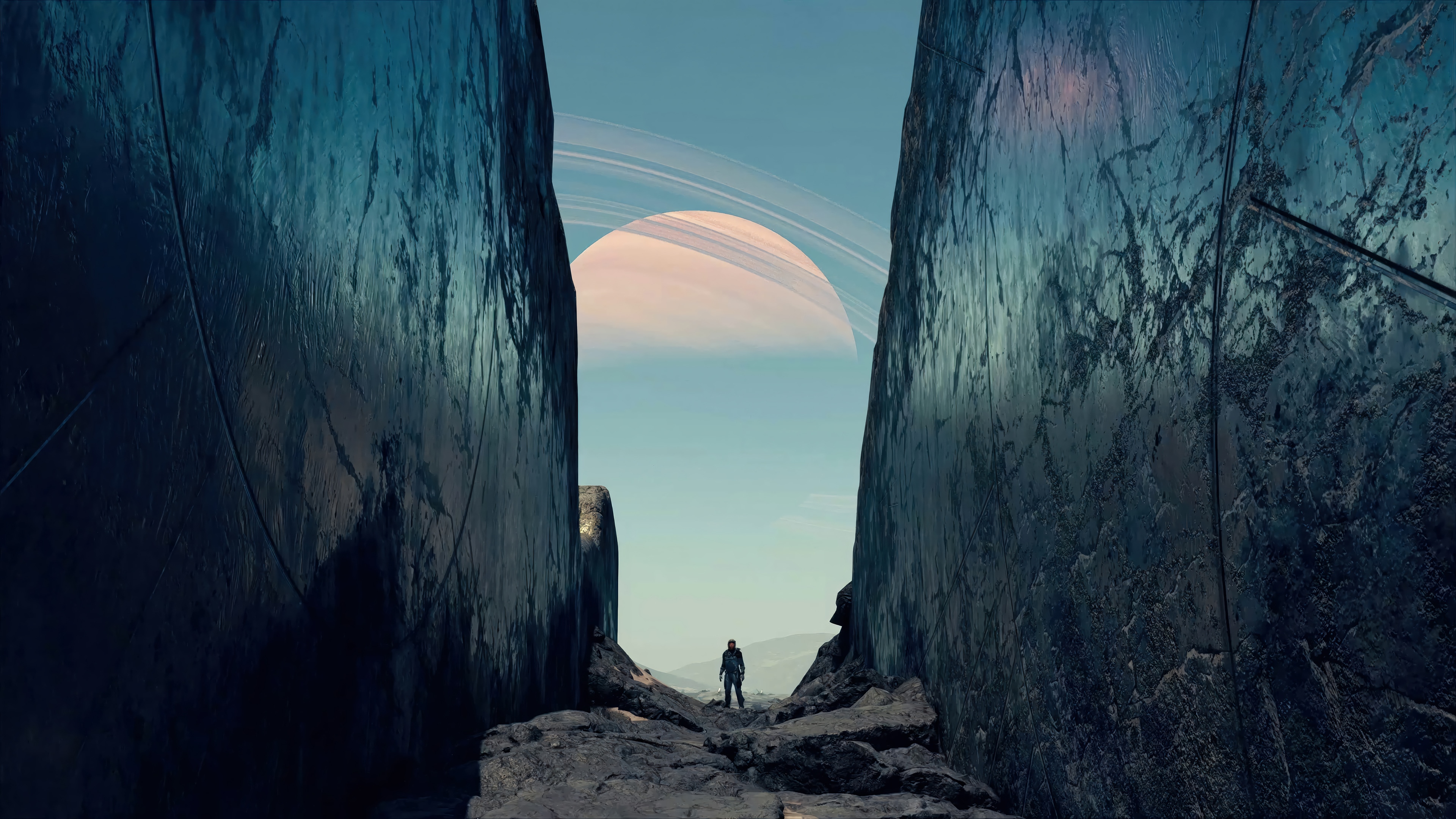 Starfield 4K: Astronaut between giant structures with Saturn in background HD Wallpaper