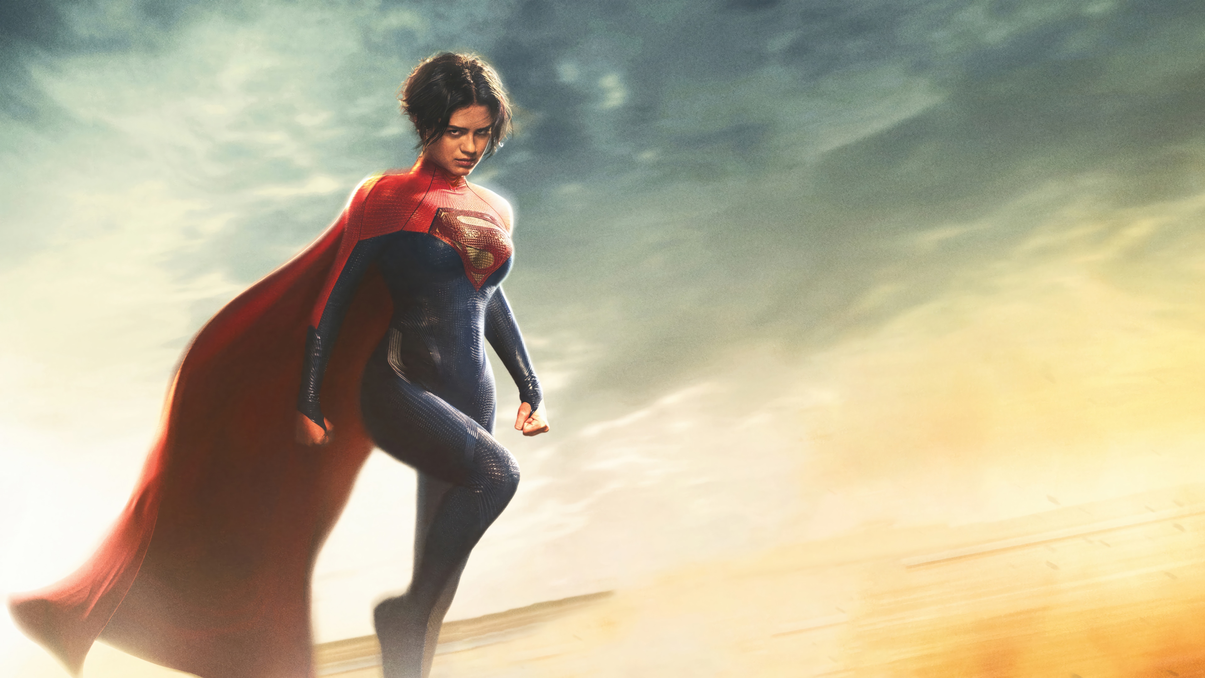 Supergirl in a desert landscape 4K HD Wallpaper