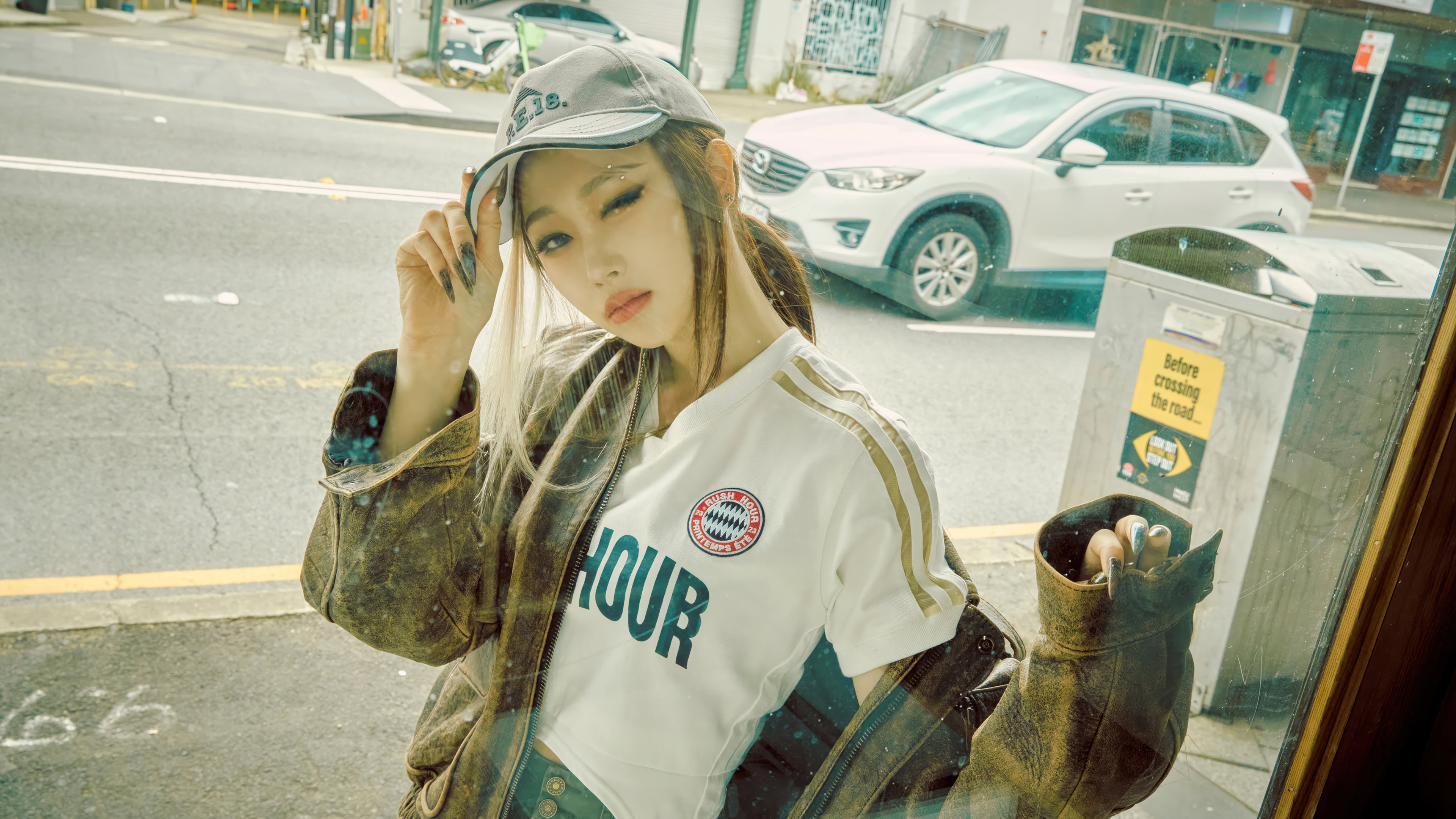 Giselle from Aespa wearing a cap and jacket HD Wallpaper
