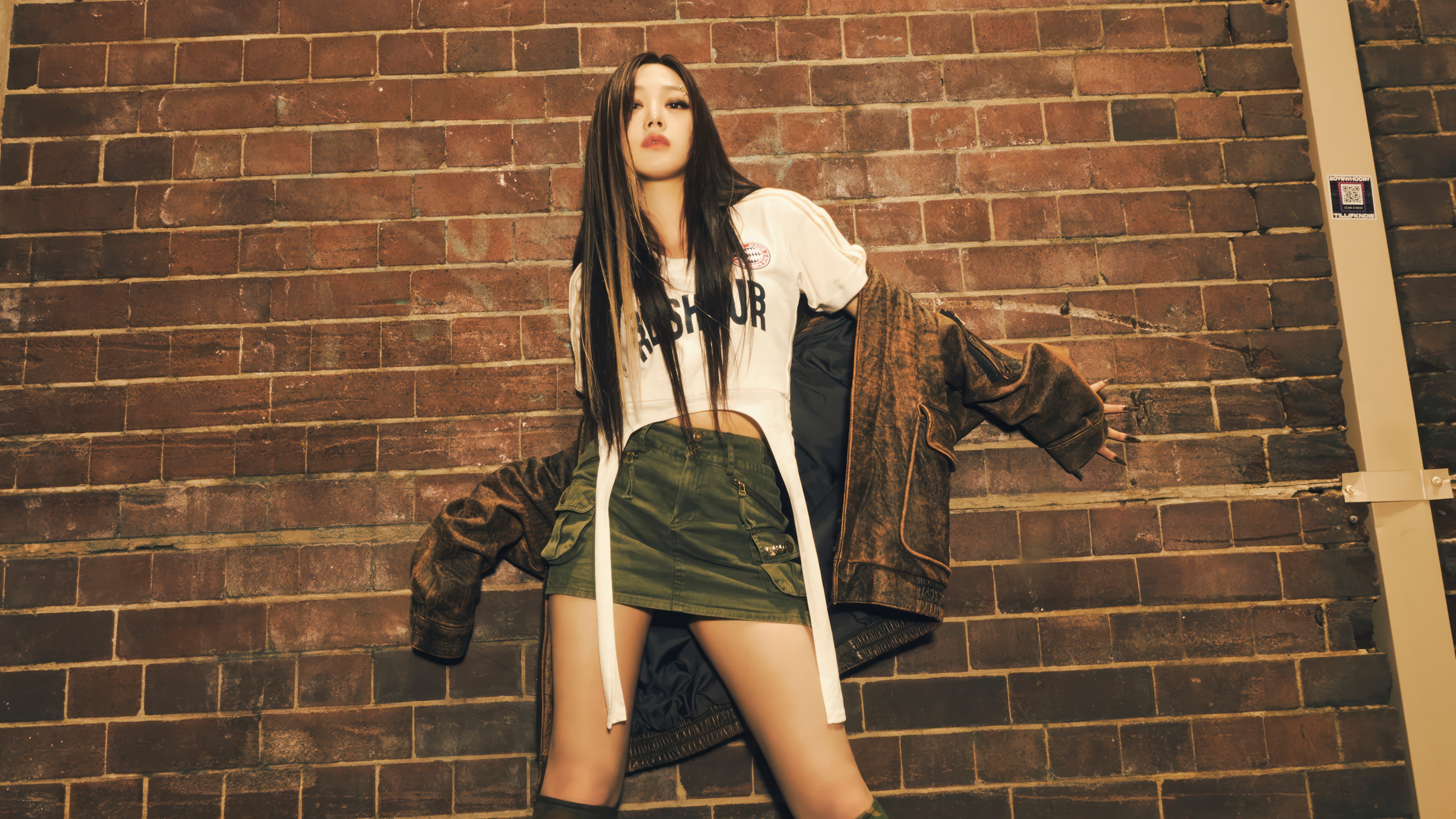 Aespa Giselle in a brown jacket and green skirt HD Wallpaper