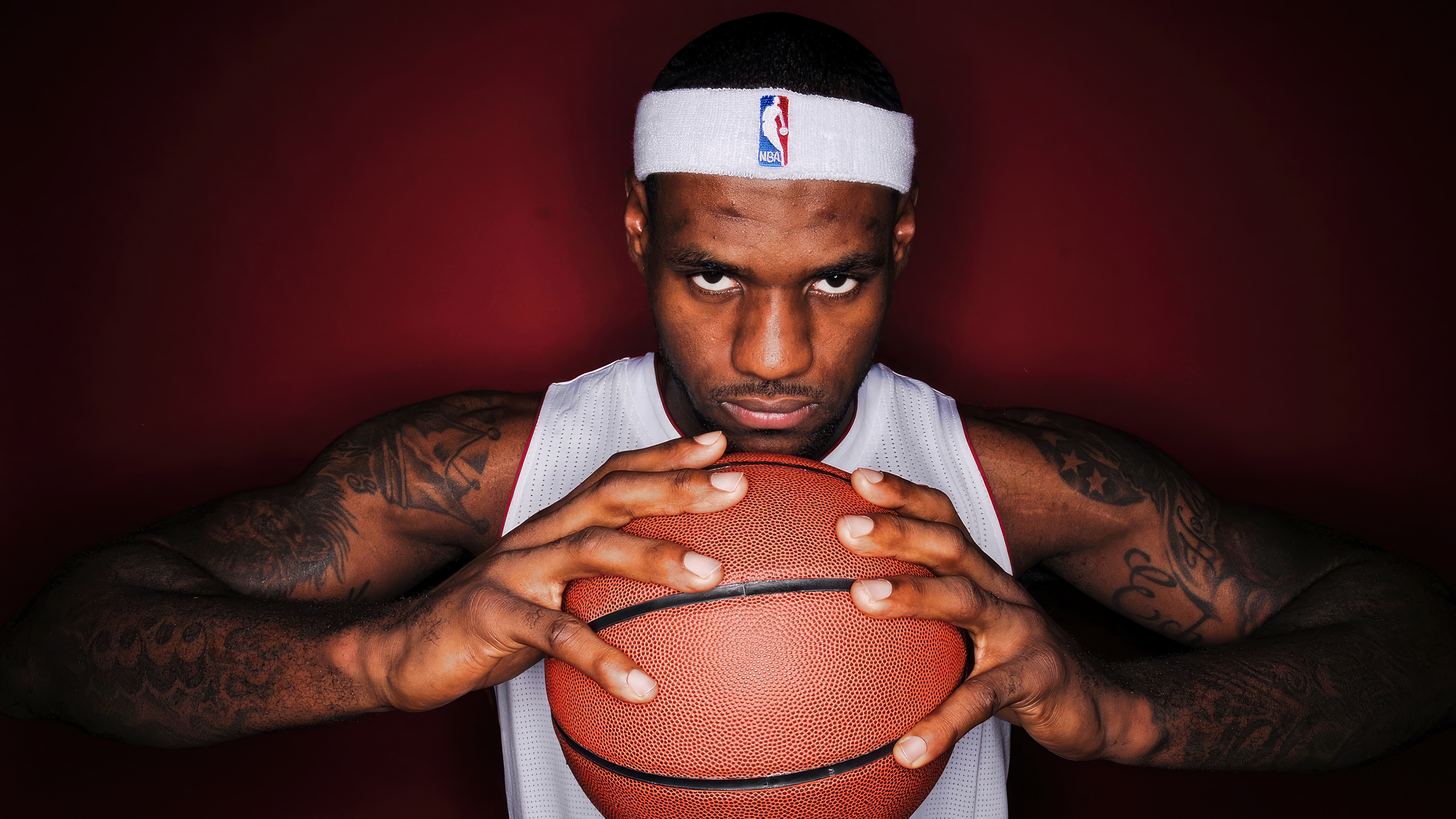 LeBron James holding a basketball HD Wallpaper
