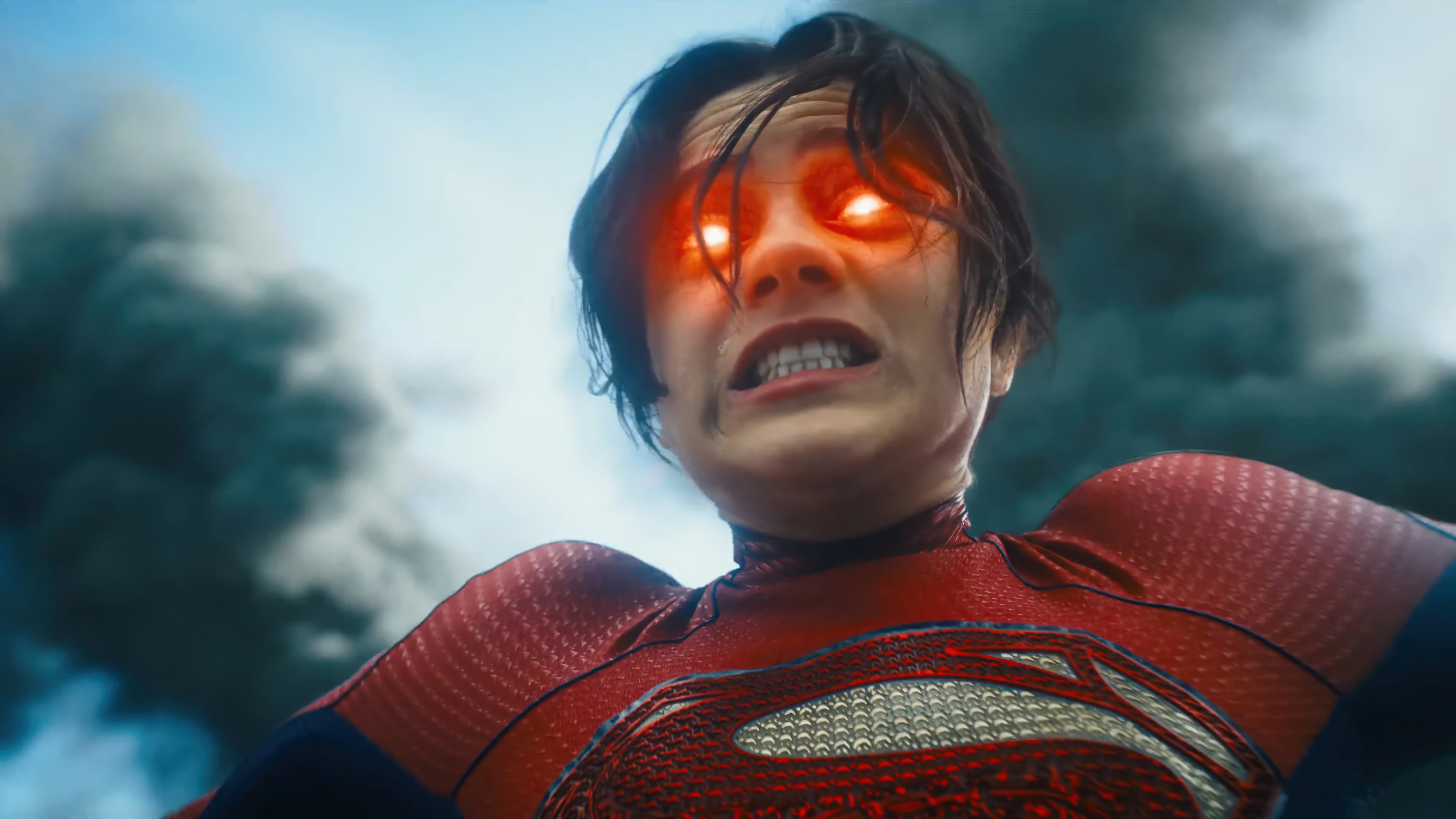 Supergirl with glowing eyes in The Flash 4K HD Wallpaper