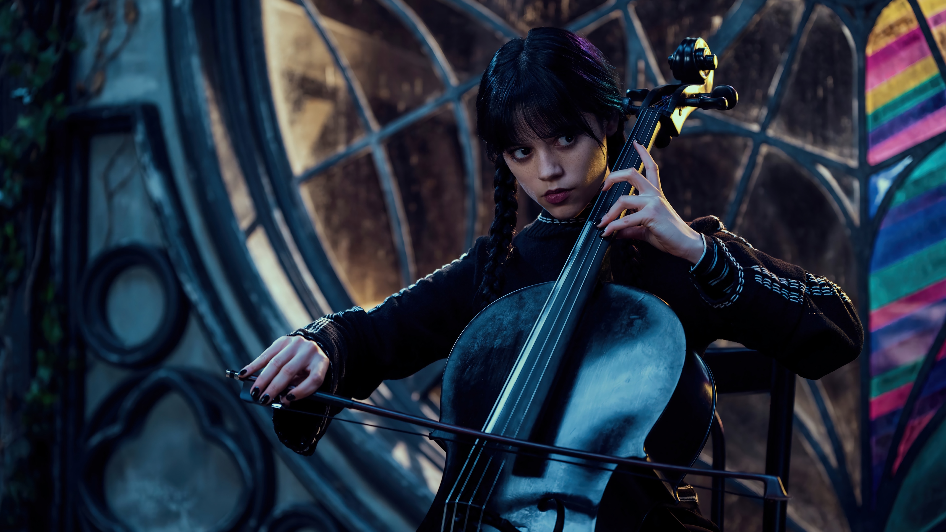 Wednesday Addams plays the cello in 4K HD Wallpaper