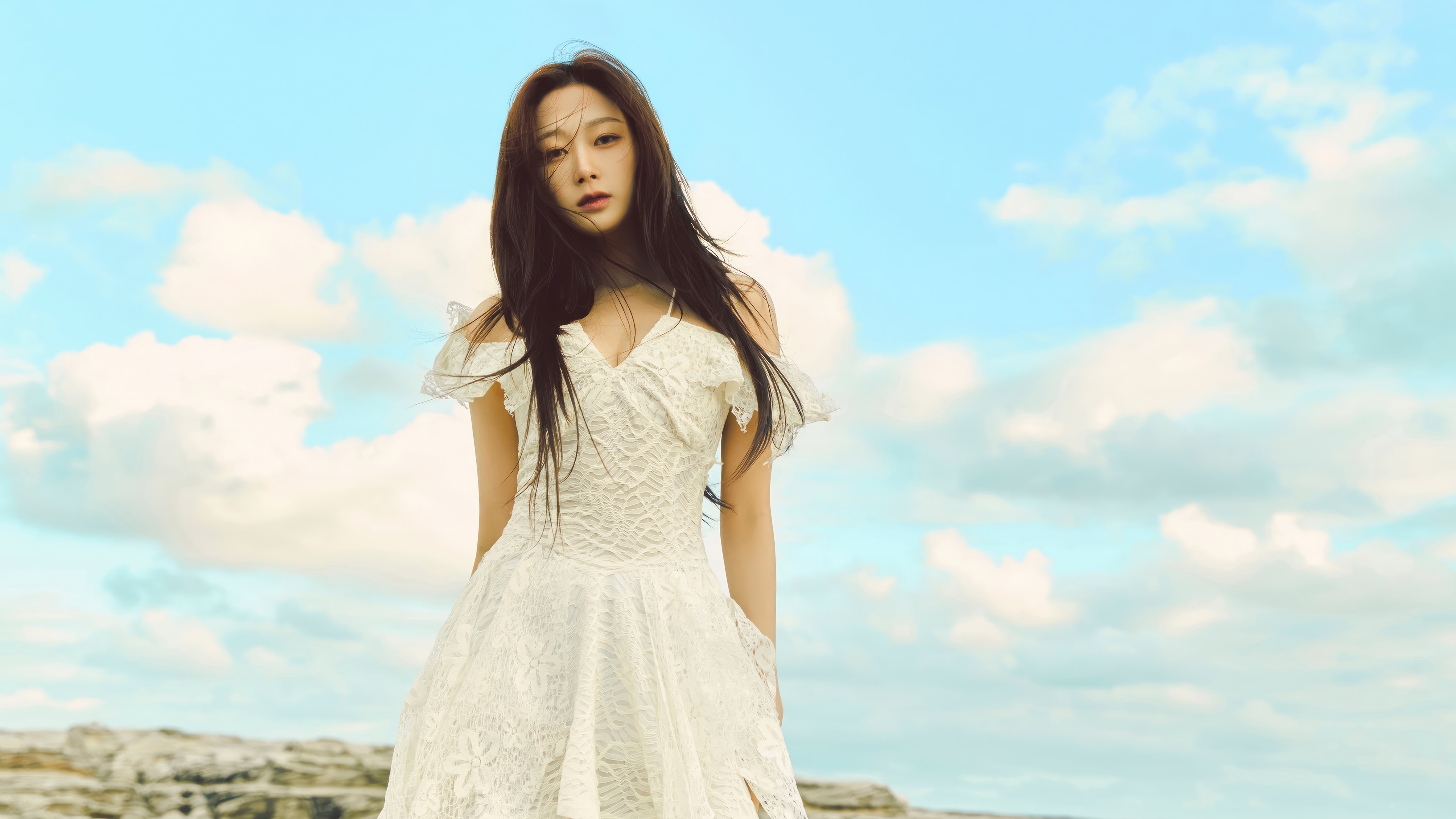 Giselle from Aespa in a white dress under the sky HD Wallpaper