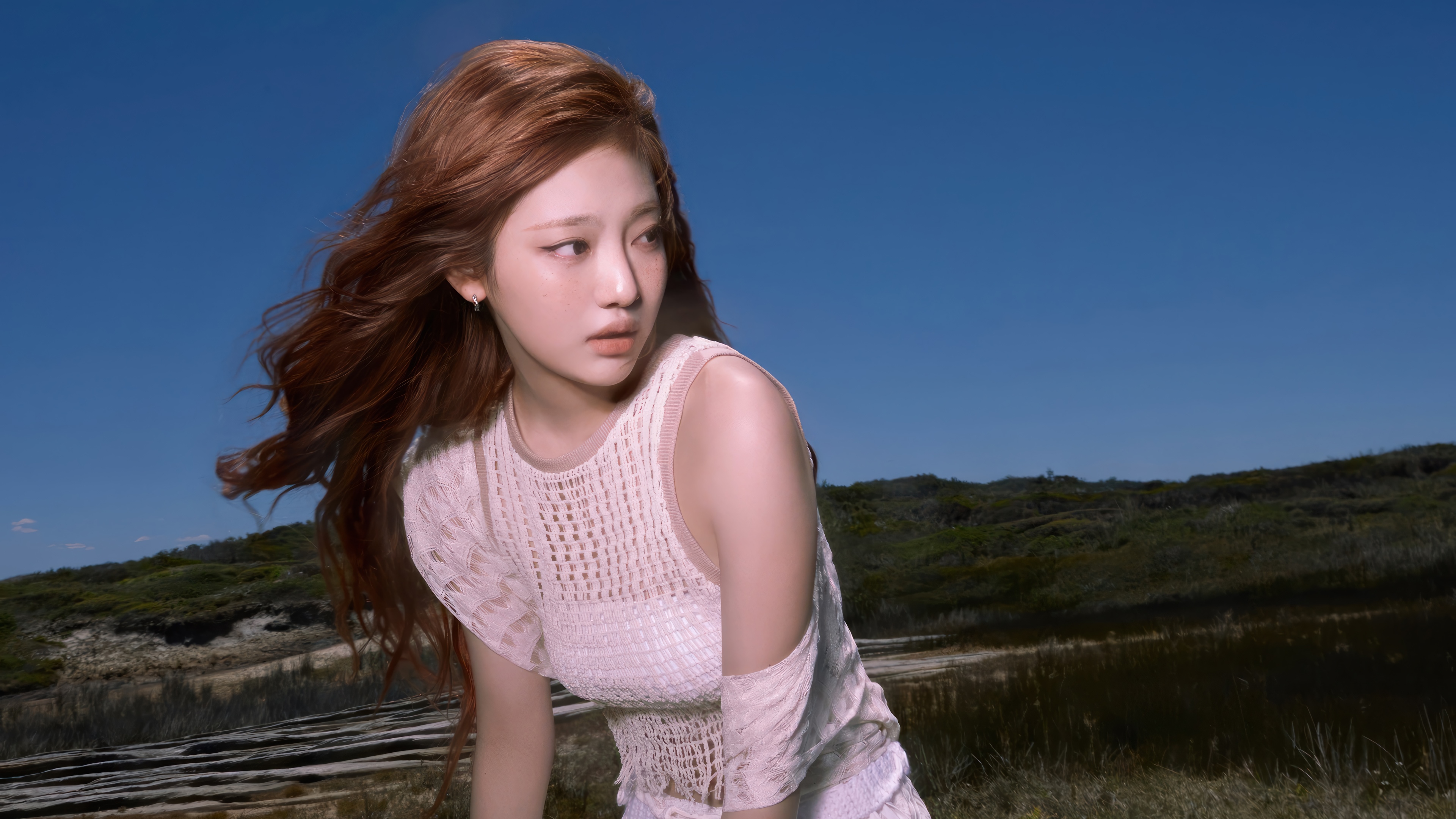 Ningning from Aespa in a white dress HD Wallpaper