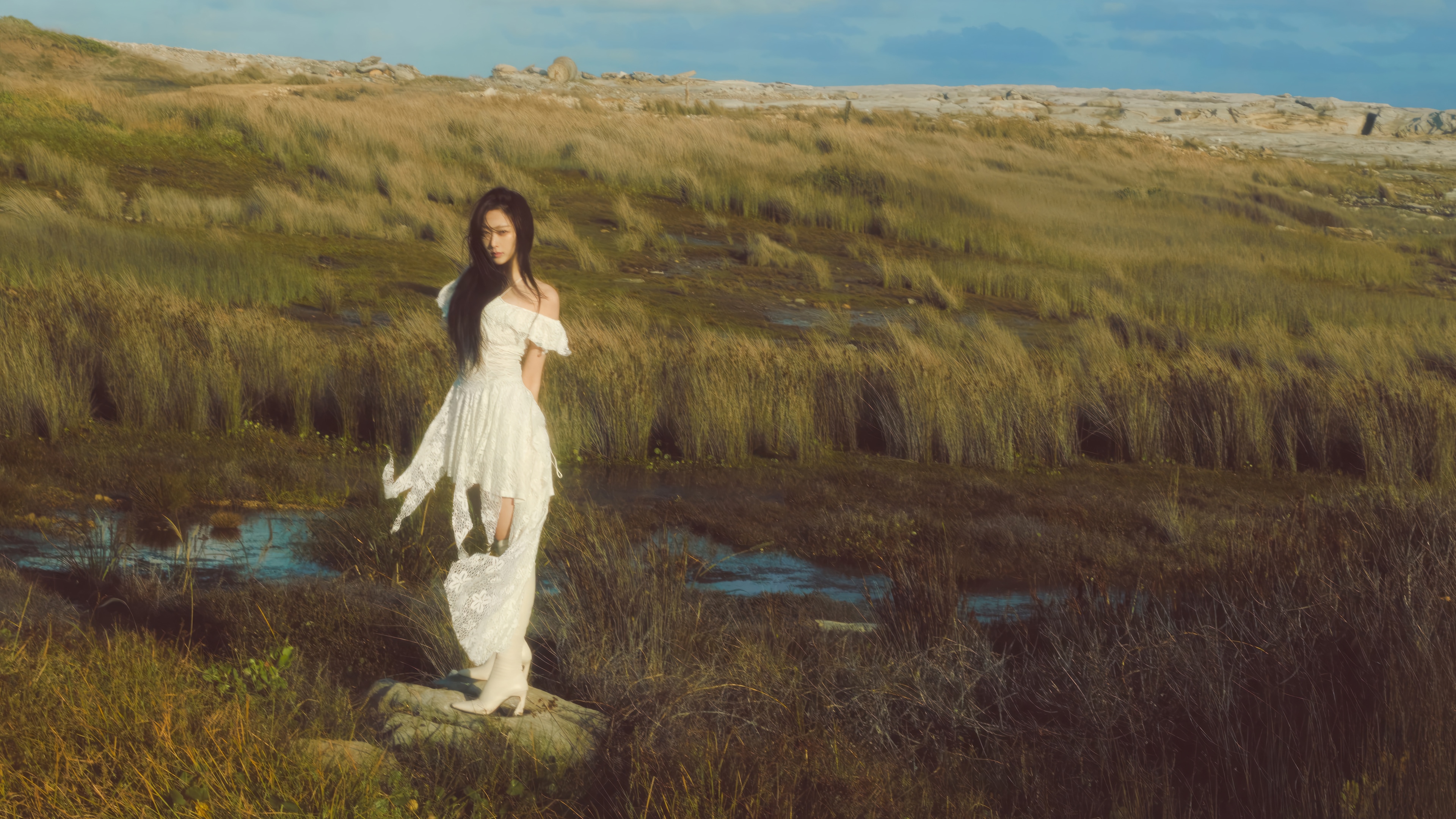Aespa Giselle in a white dress in a marsh HD Wallpaper