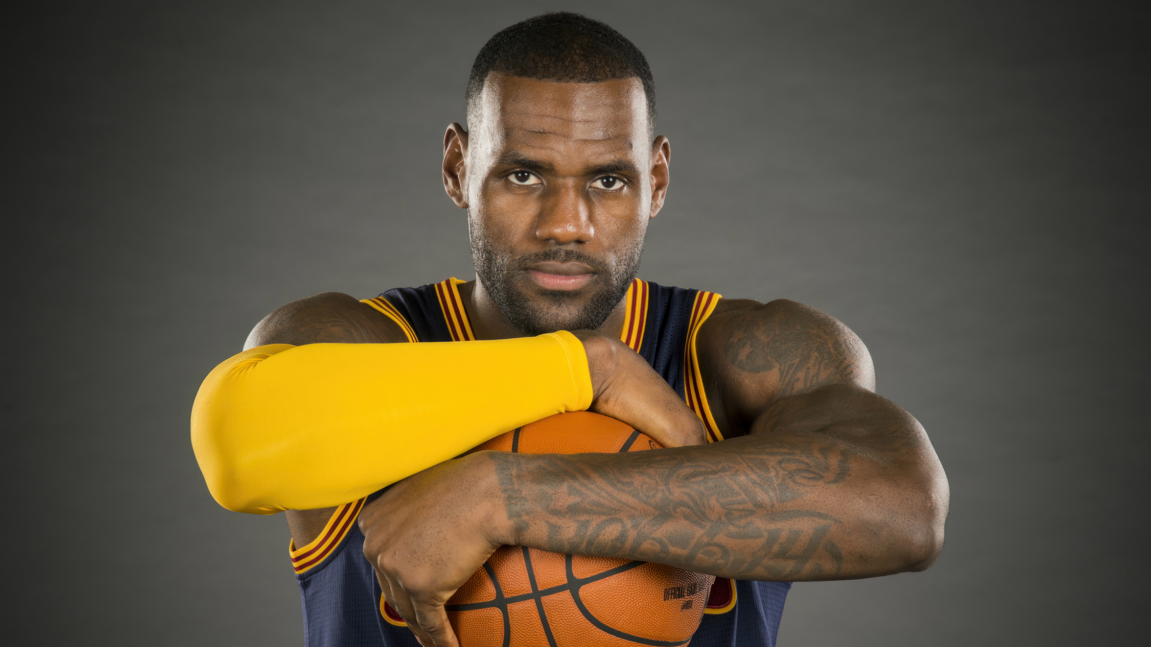 LeBron James holding a basketball HD Wallpaper
