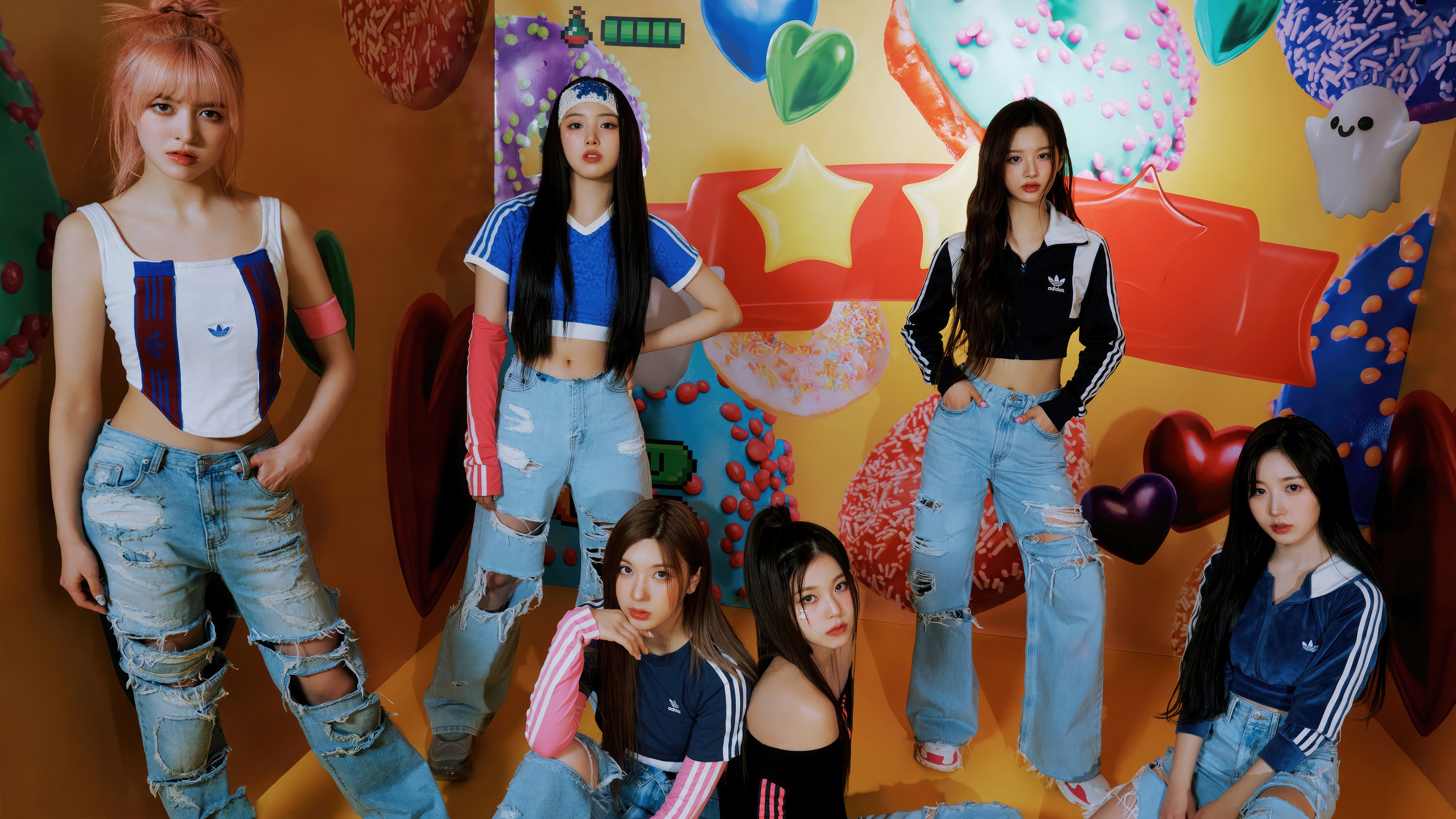 NMIXX members in colorful, candy-themed outfits HD Wallpaper