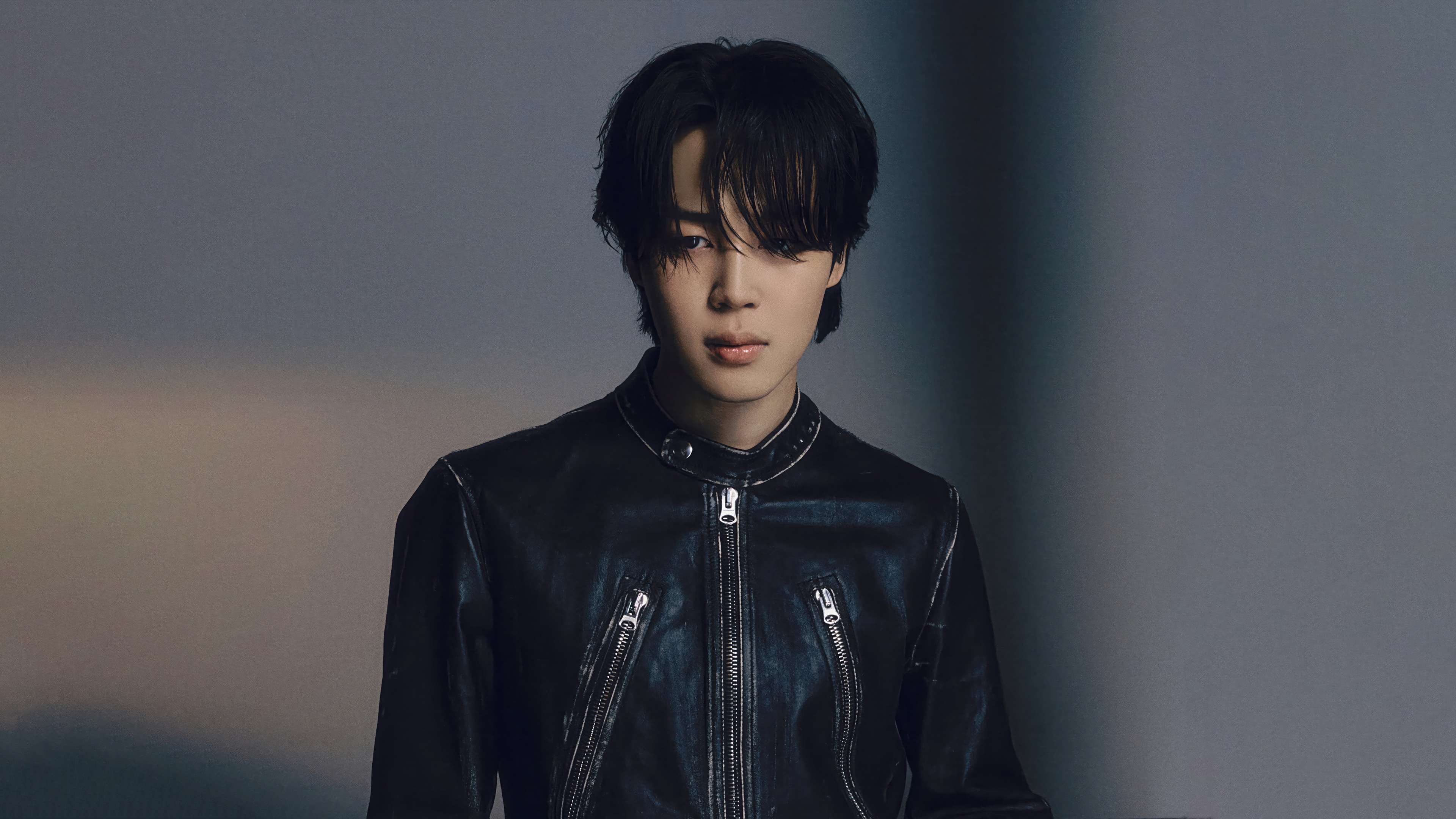 Jimin of BTS in a black leather jacket HD Wallpaper
