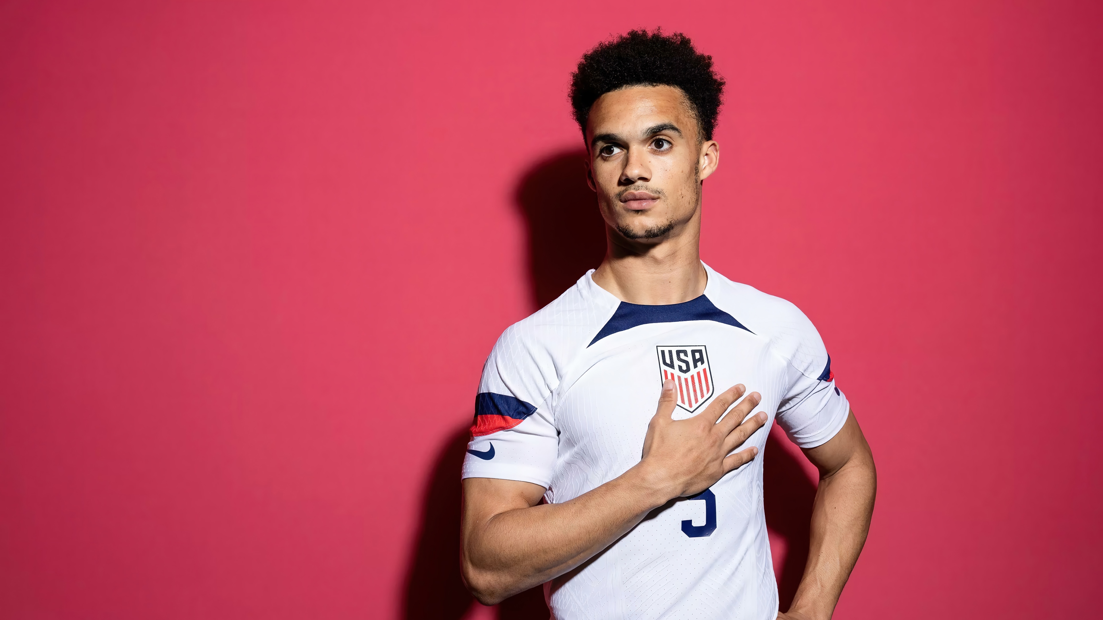 USA Soccer Player with Hand on Chest HD Wallpaper