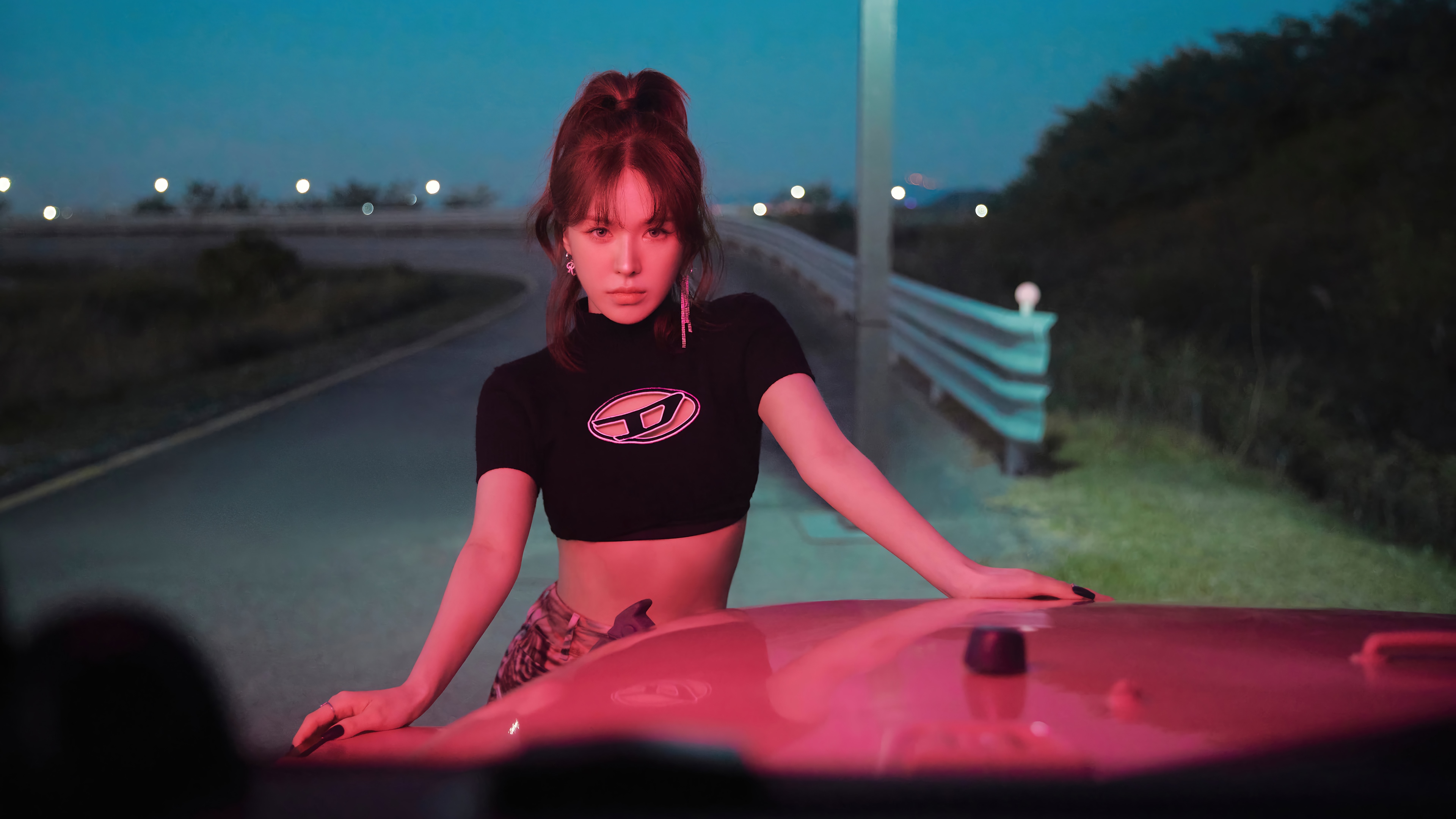 Wendy from Red Velvet leans on a car at night HD Wallpaper