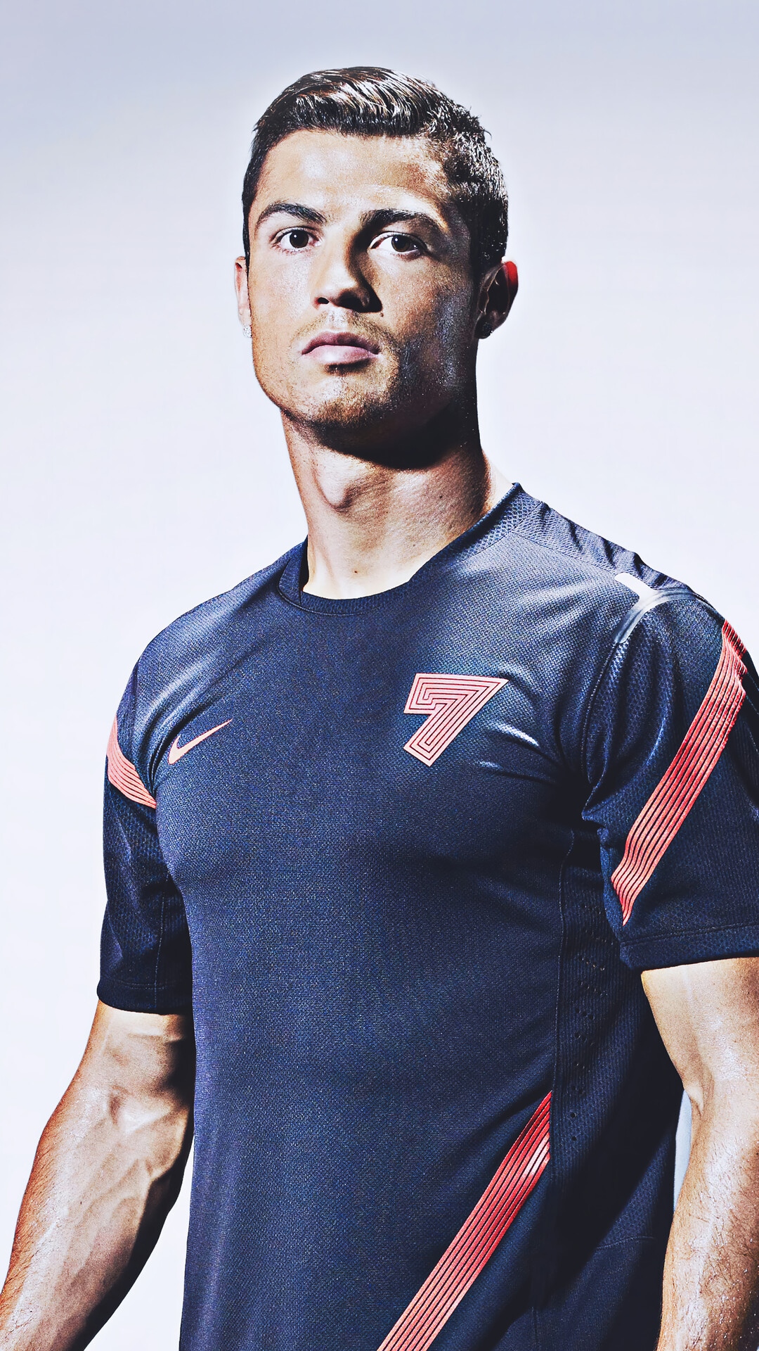 Cristiano Ronaldo in a dark blue Nike shirt HD Phone Wallpaper