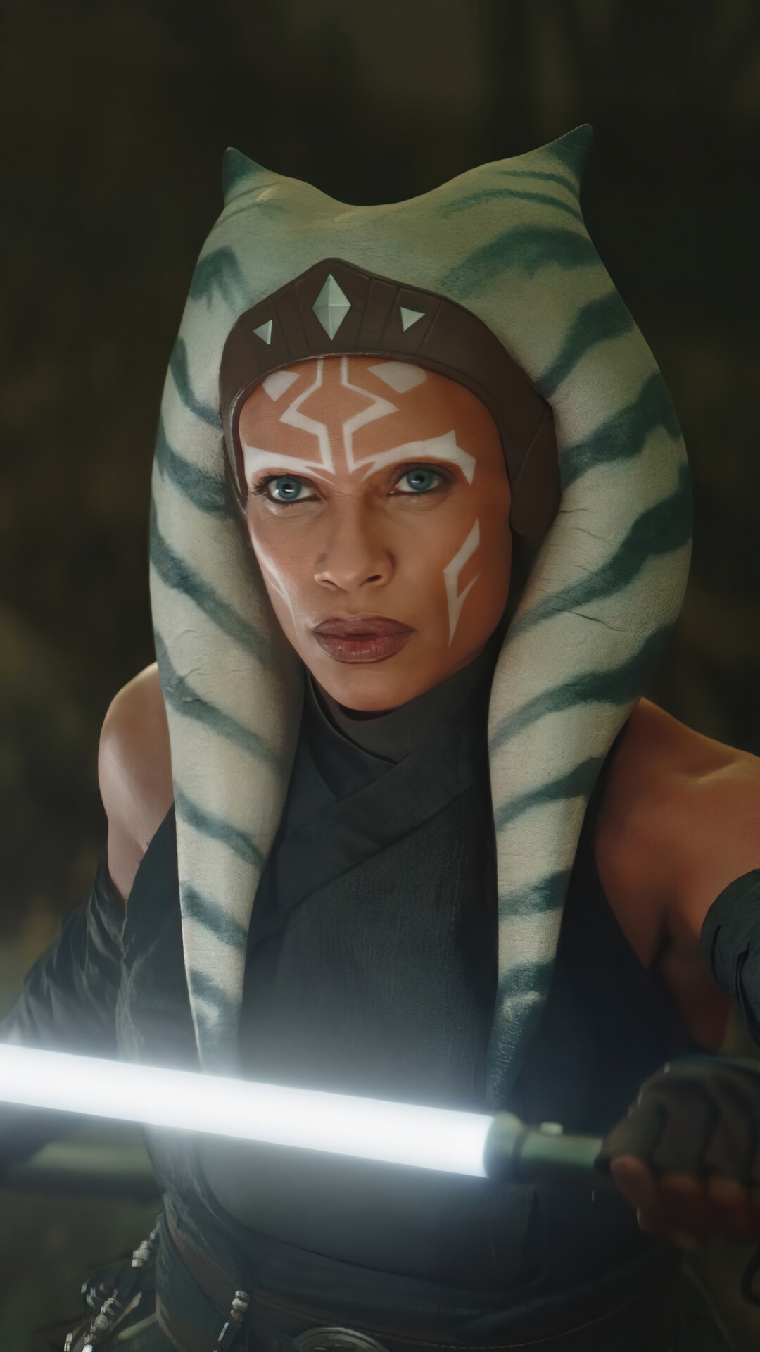 Ahsoka Tano holding a lightsaber HD Phone Wallpaper