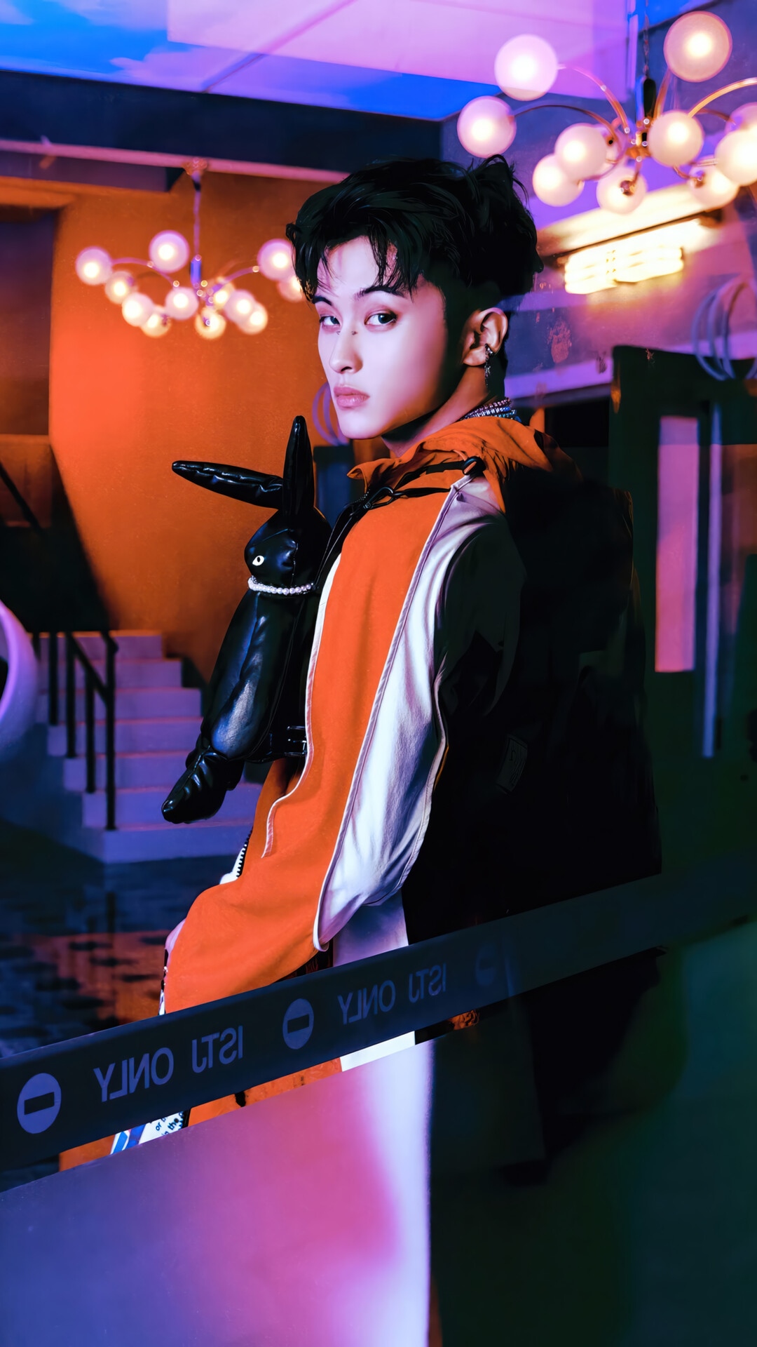 Mark from NCT DREAM with a black bunny bag HD Phone Wallpaper