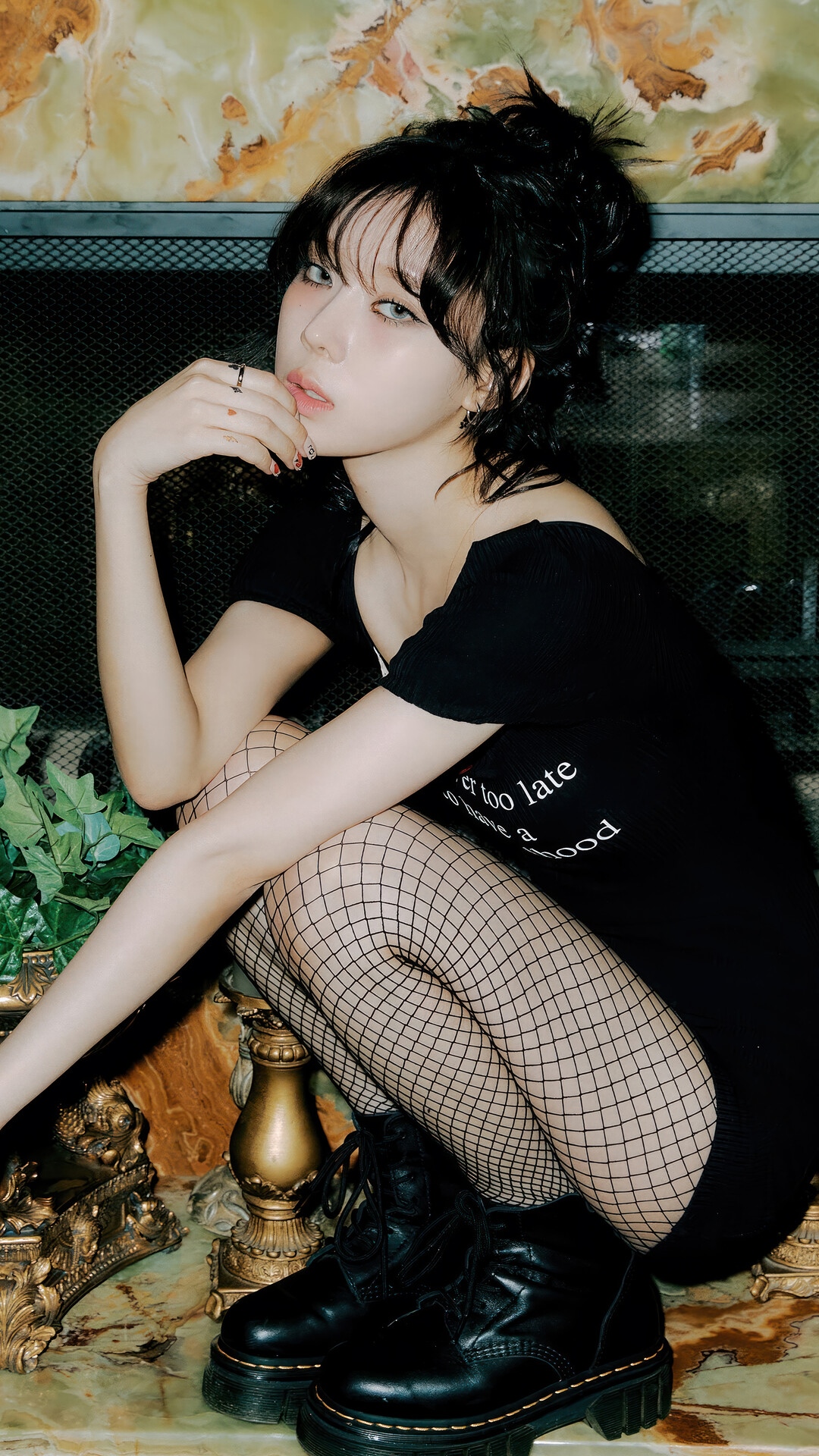 Winter from Aespa in a black dress and fishnet stockings HD Phone Wallpaper