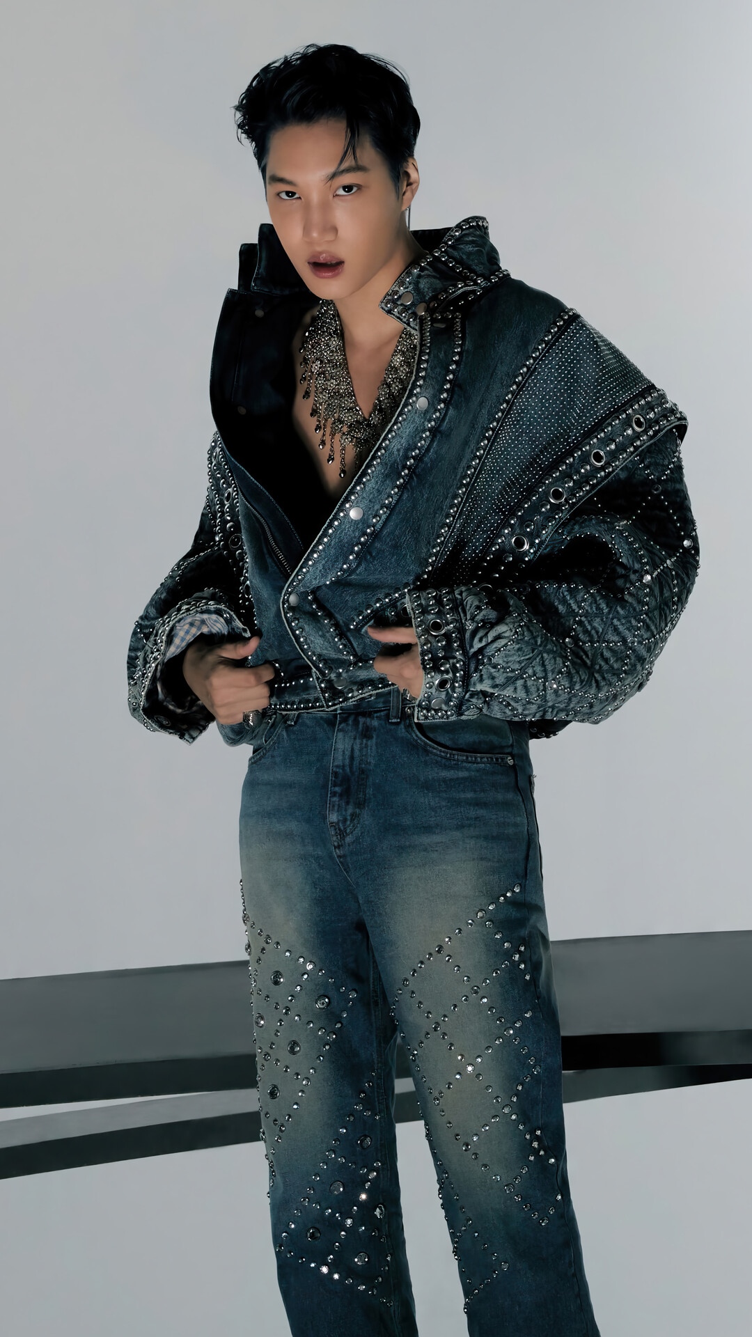 Kai in a studded denim jacket and jeans HD Phone Wallpaper