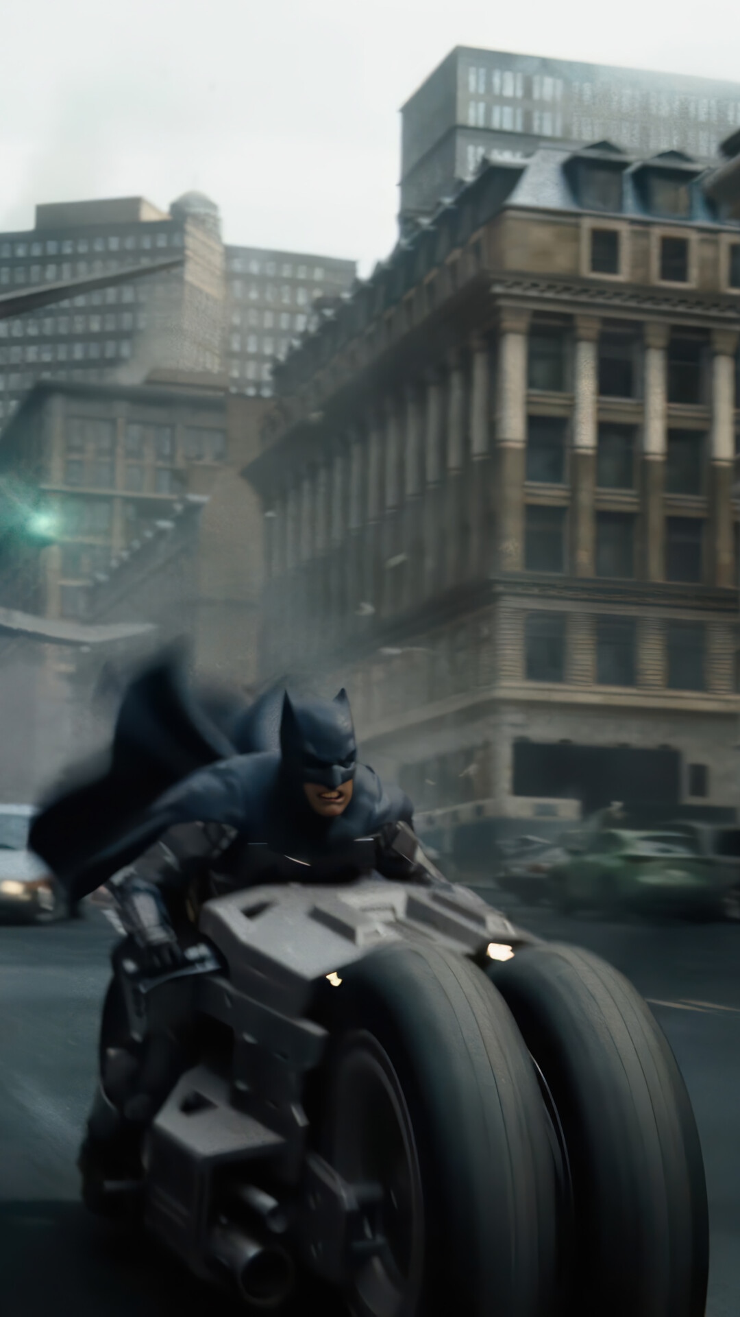 Batman riding the Batpod in a city HD Phone Wallpaper