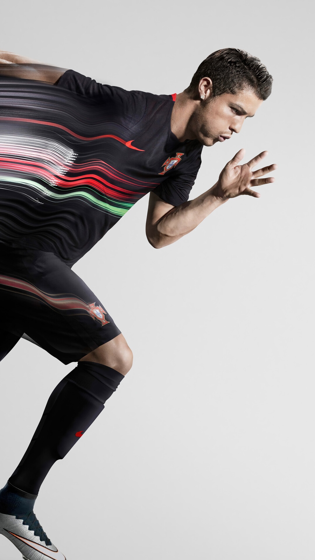 Cristiano Ronaldo in motion wearing Portugal kit HD Phone Wallpaper