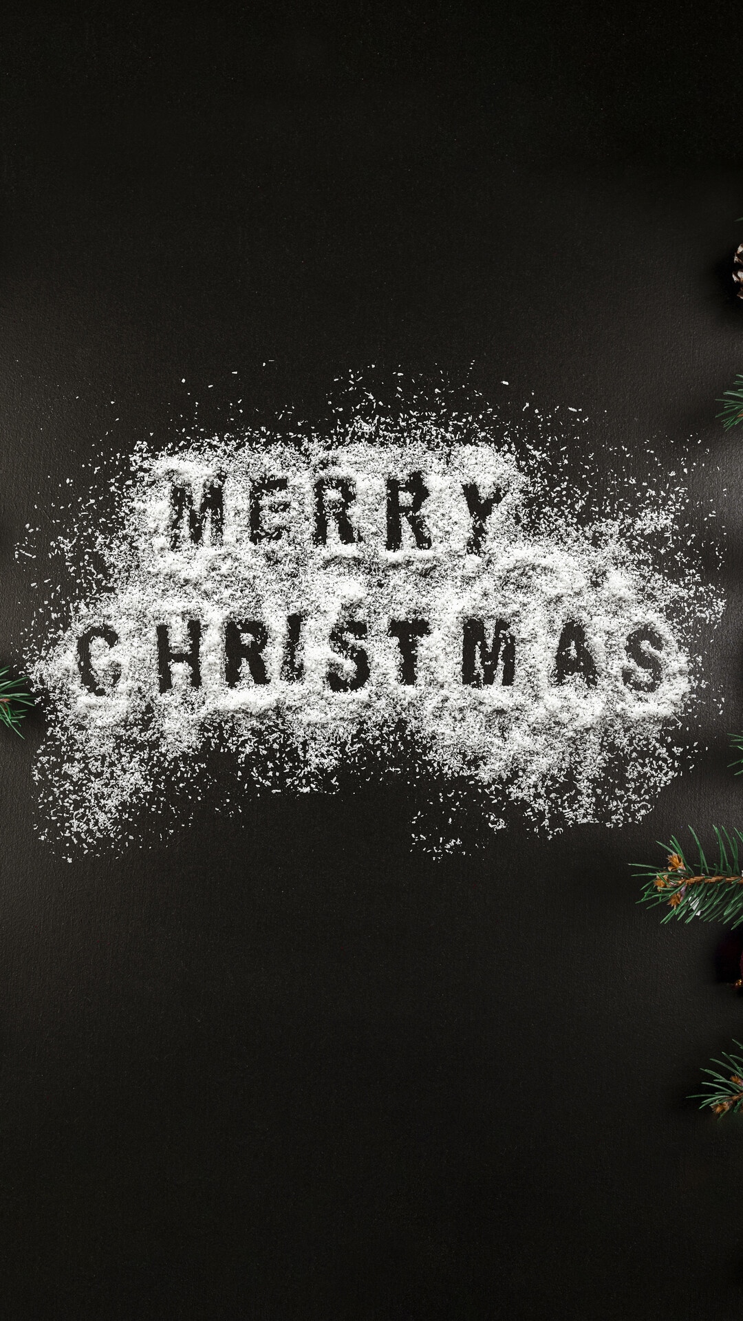 Merry Christmas written in snow with pine branches HD Phone Wallpaper