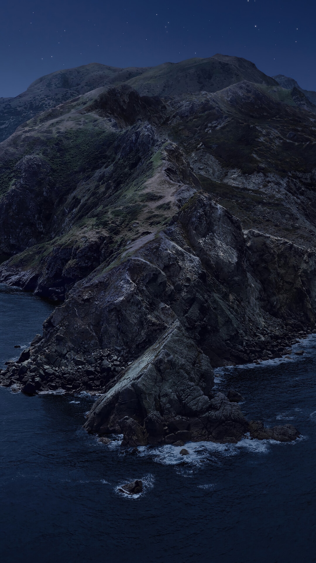 Rocky island coastline at night under starry sky HD Phone Wallpaper