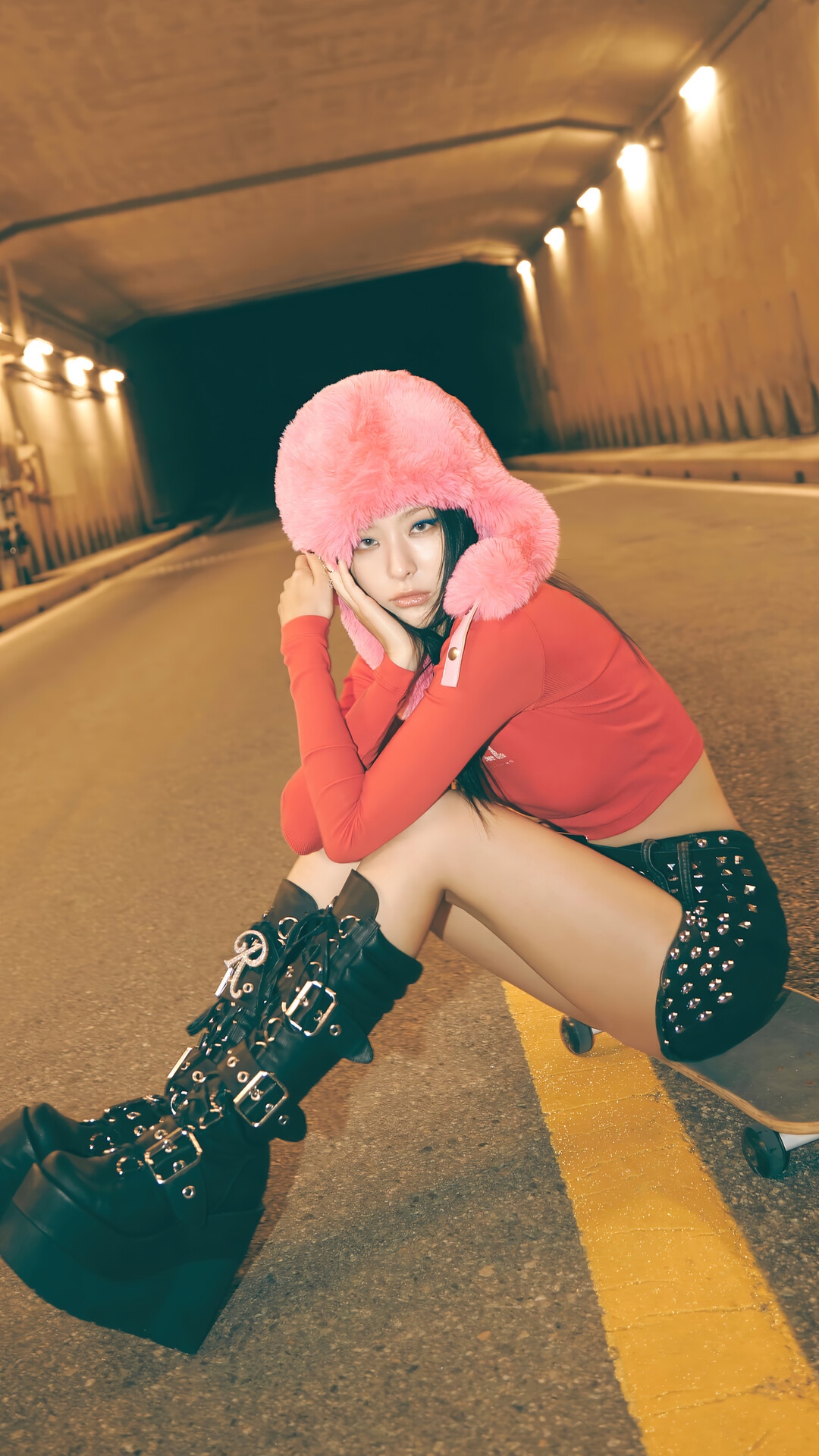 Seulgi in a red top and black studded shorts HD Phone Wallpaper