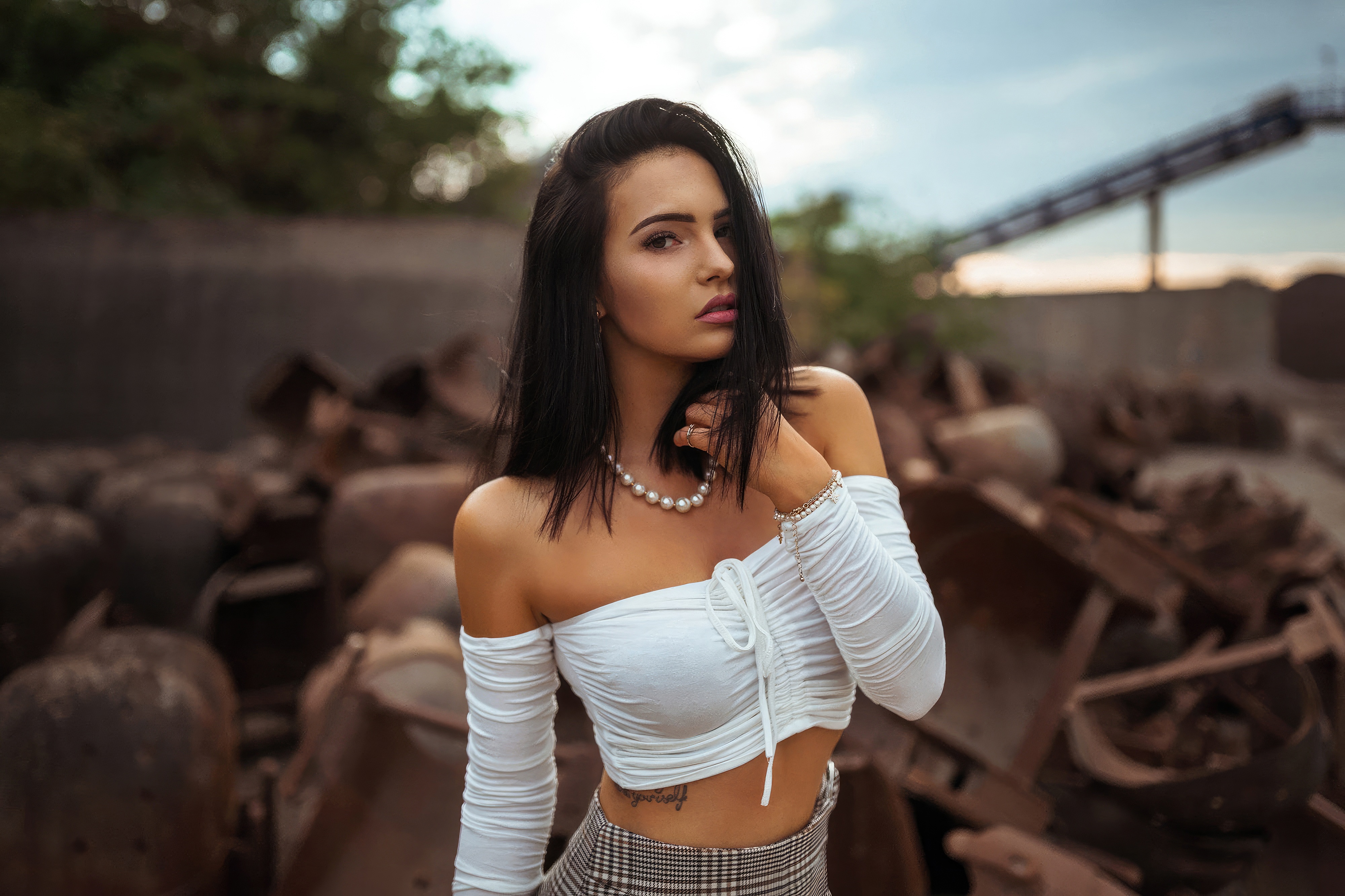 Model in white off-the-shoulder top and pearl necklace HD Wallpaper