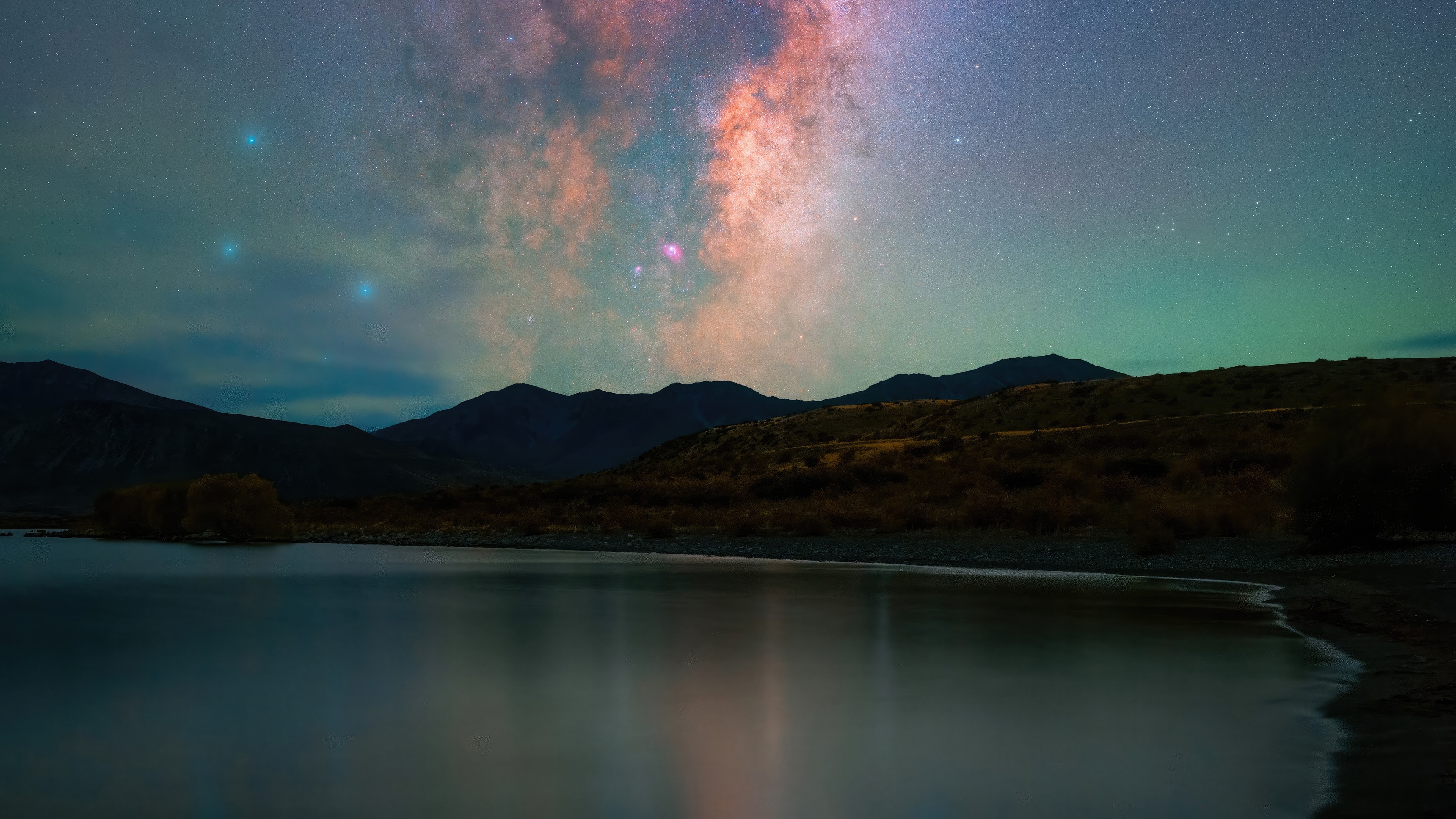 Mountains and Milky Way over a lake HD Wallpaper