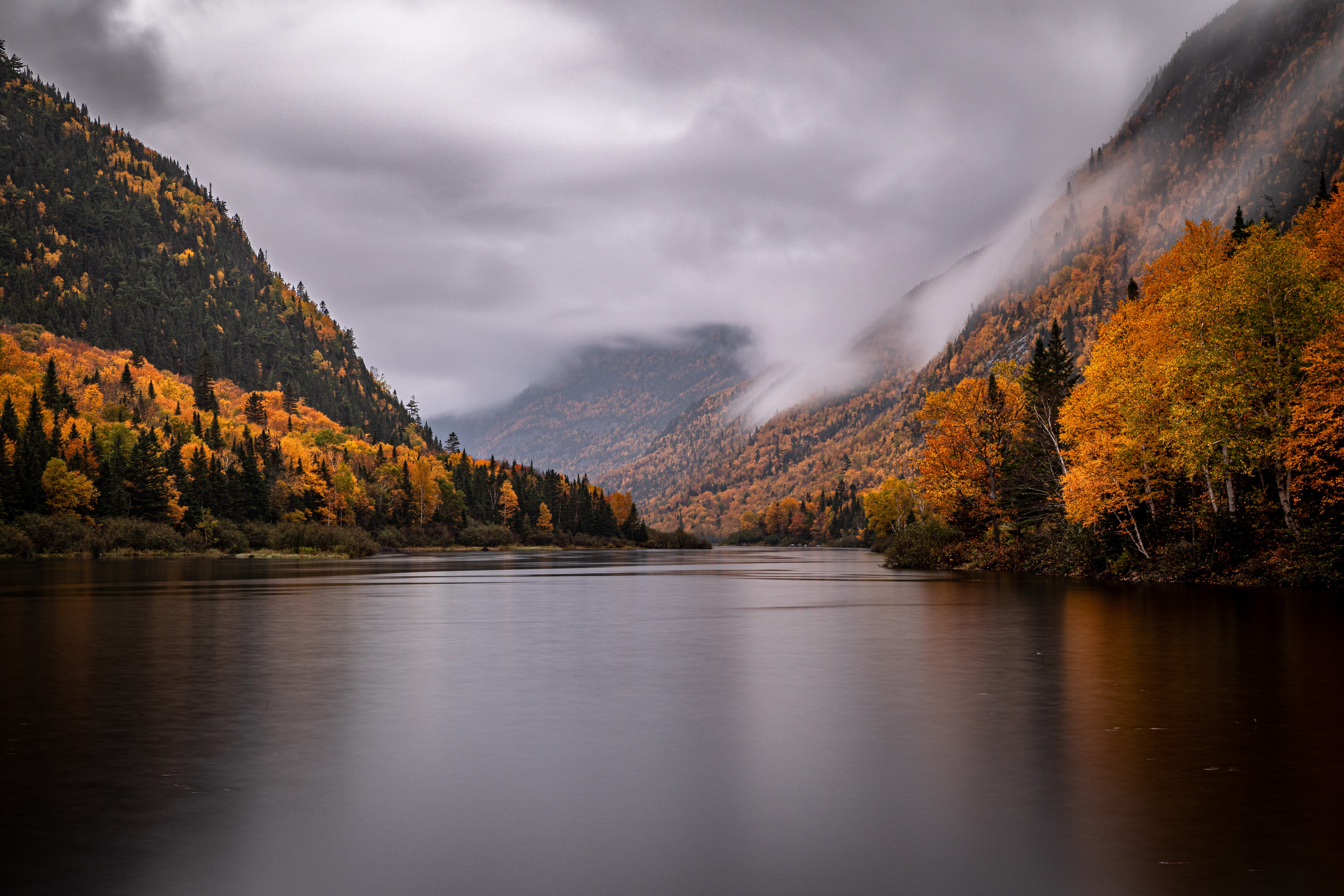 Autumn foliage in a mountain valley with a lake HD Wallpaper