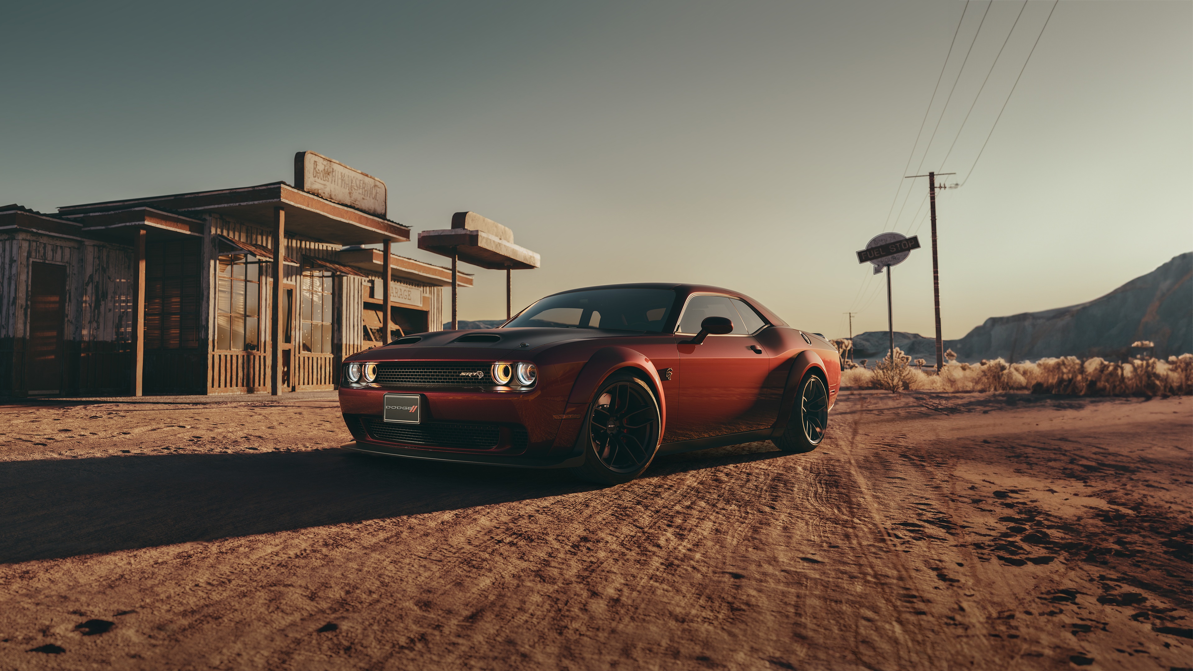 Red Dodge Challenger in a Desert Landscape HD Wallpaper