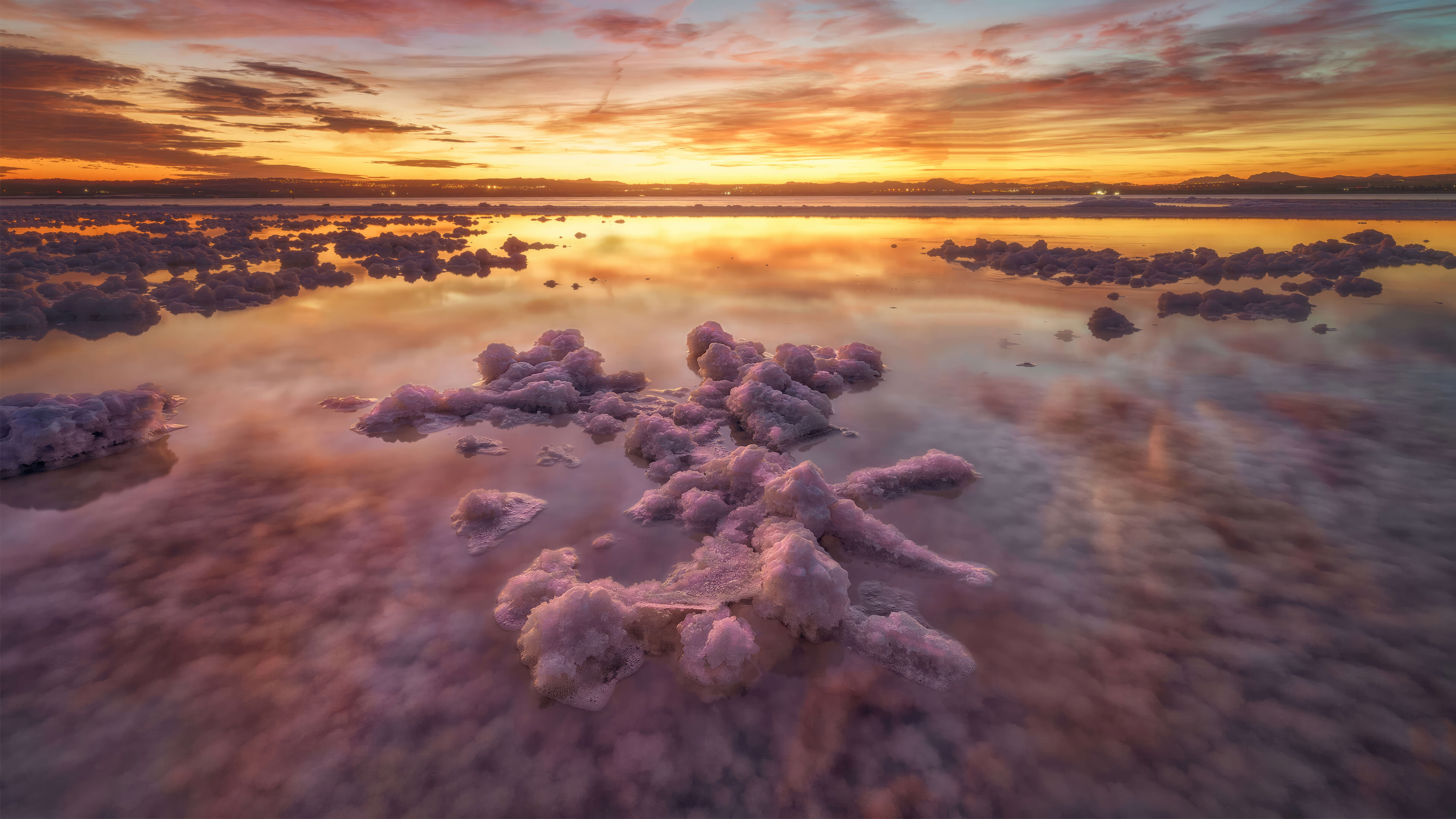 Salt formations in a lake at sunset in Spain HD Wallpaper