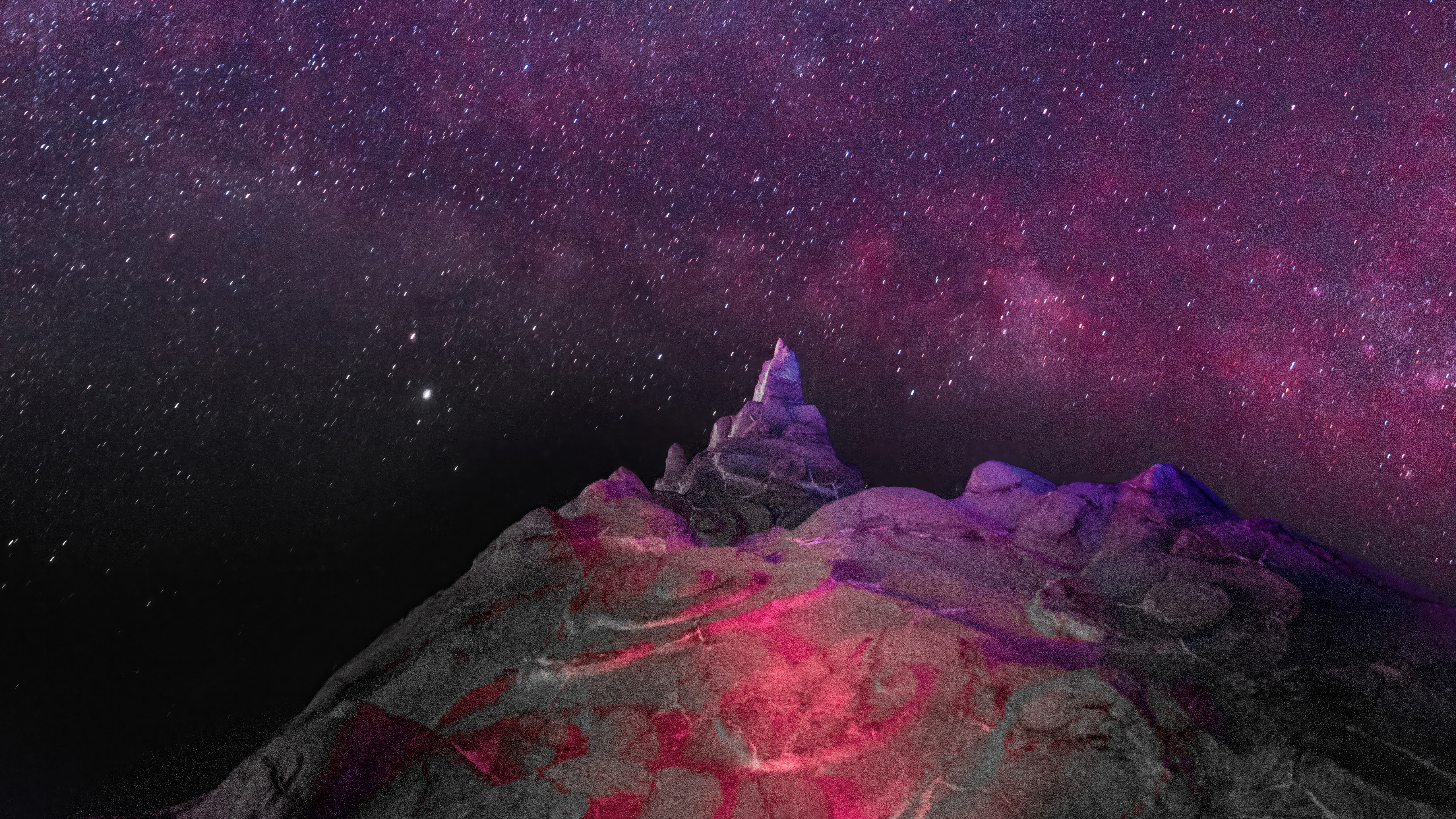 Mountain peak under a starry night sky HD Wallpaper