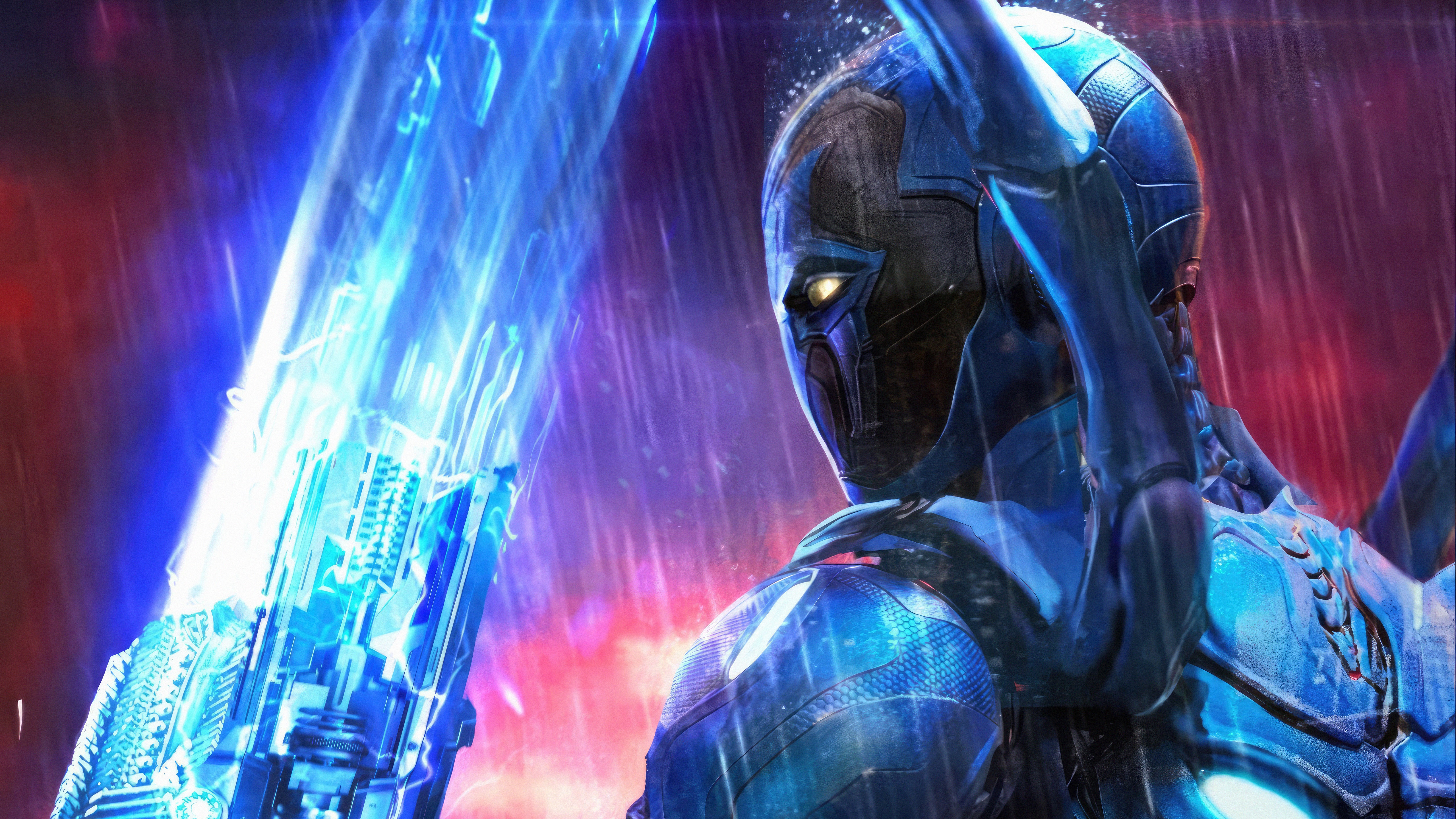 Blue Beetle holding a glowing blue weapon HD Wallpaper