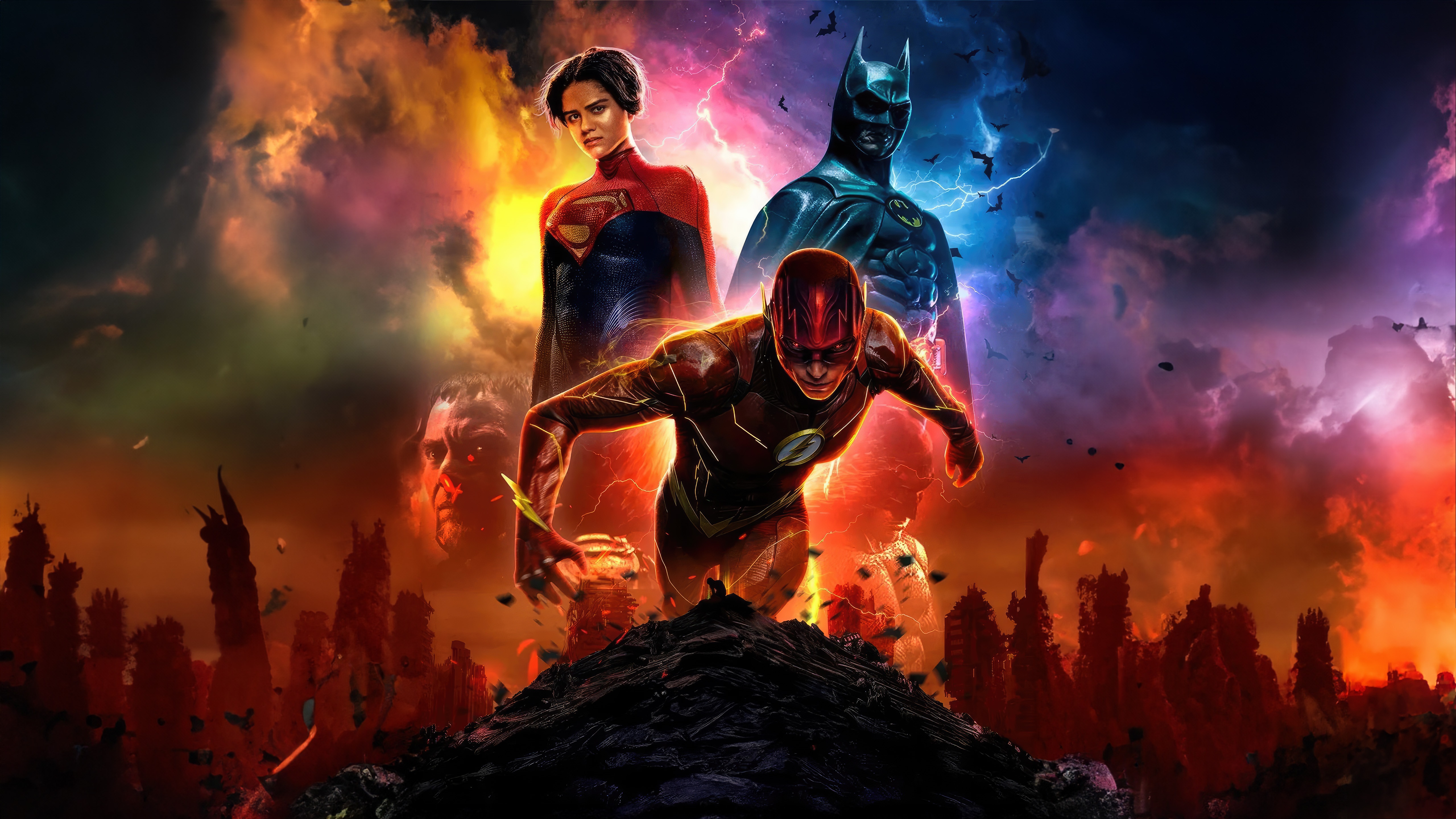 The Flash, Supergirl, and Batman in a chaotic scene HD Wallpaper