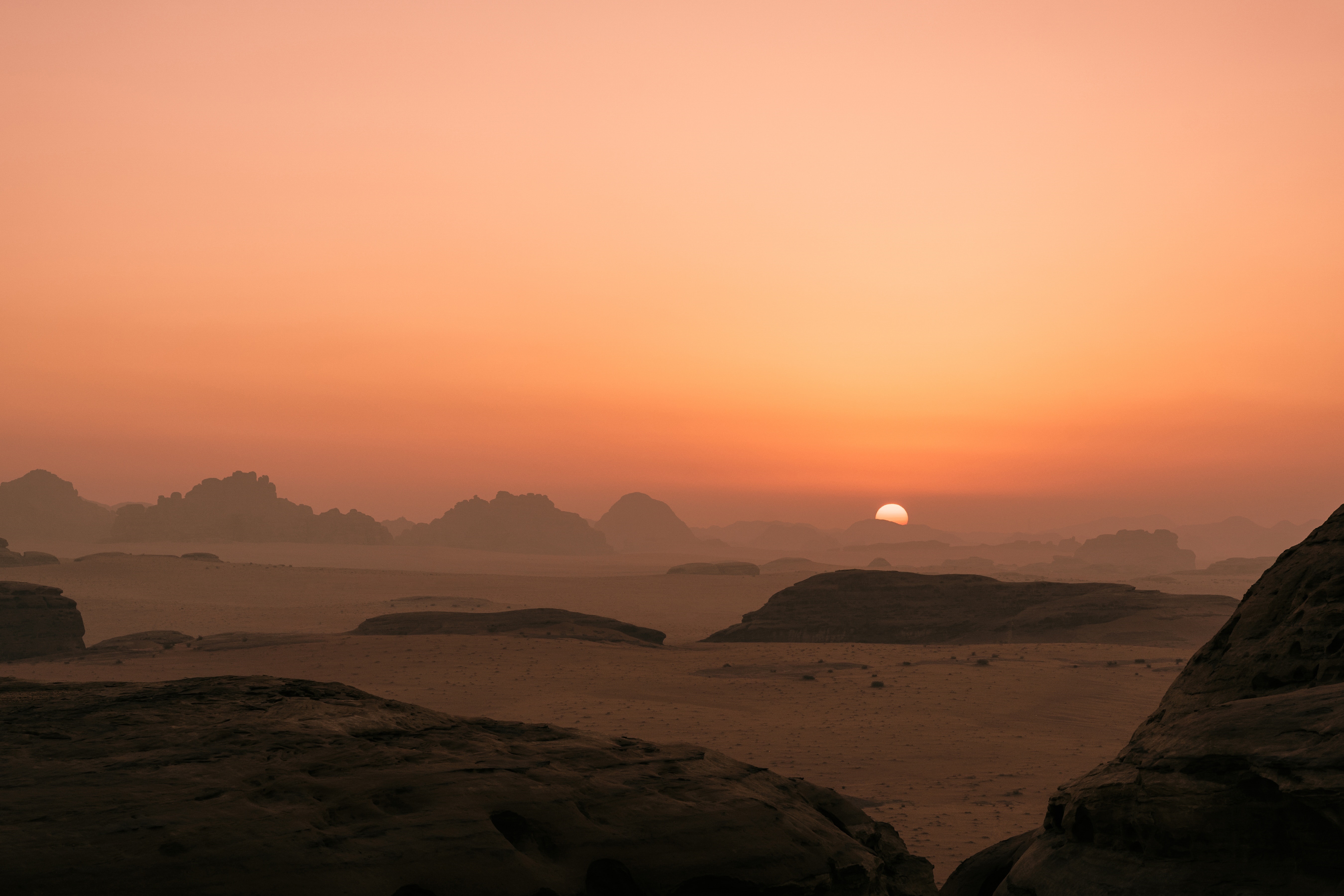 Desert landscape at sunset with rocky formations HD Wallpaper