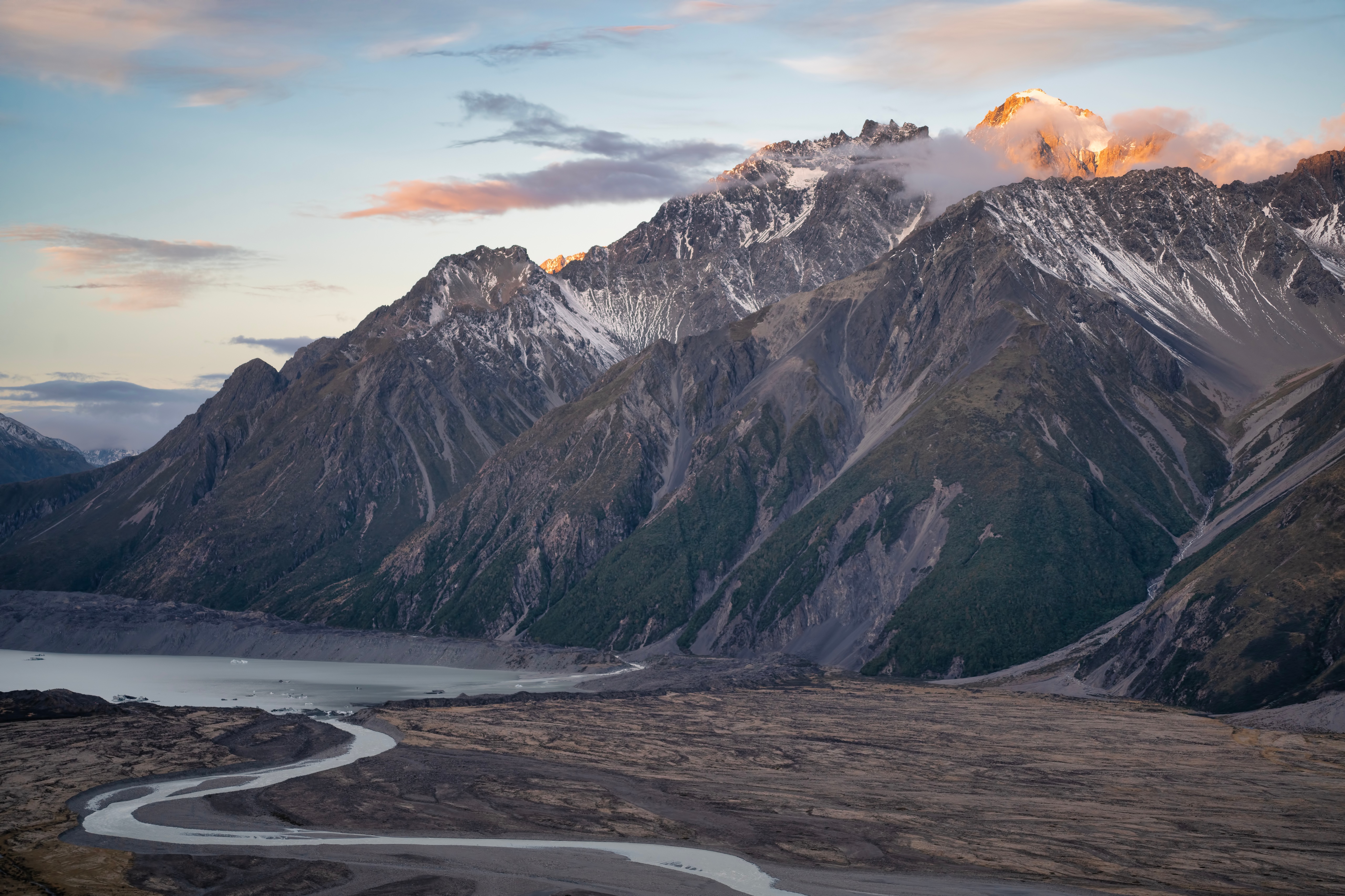 River flowing through mountains at sunset HD Wallpaper