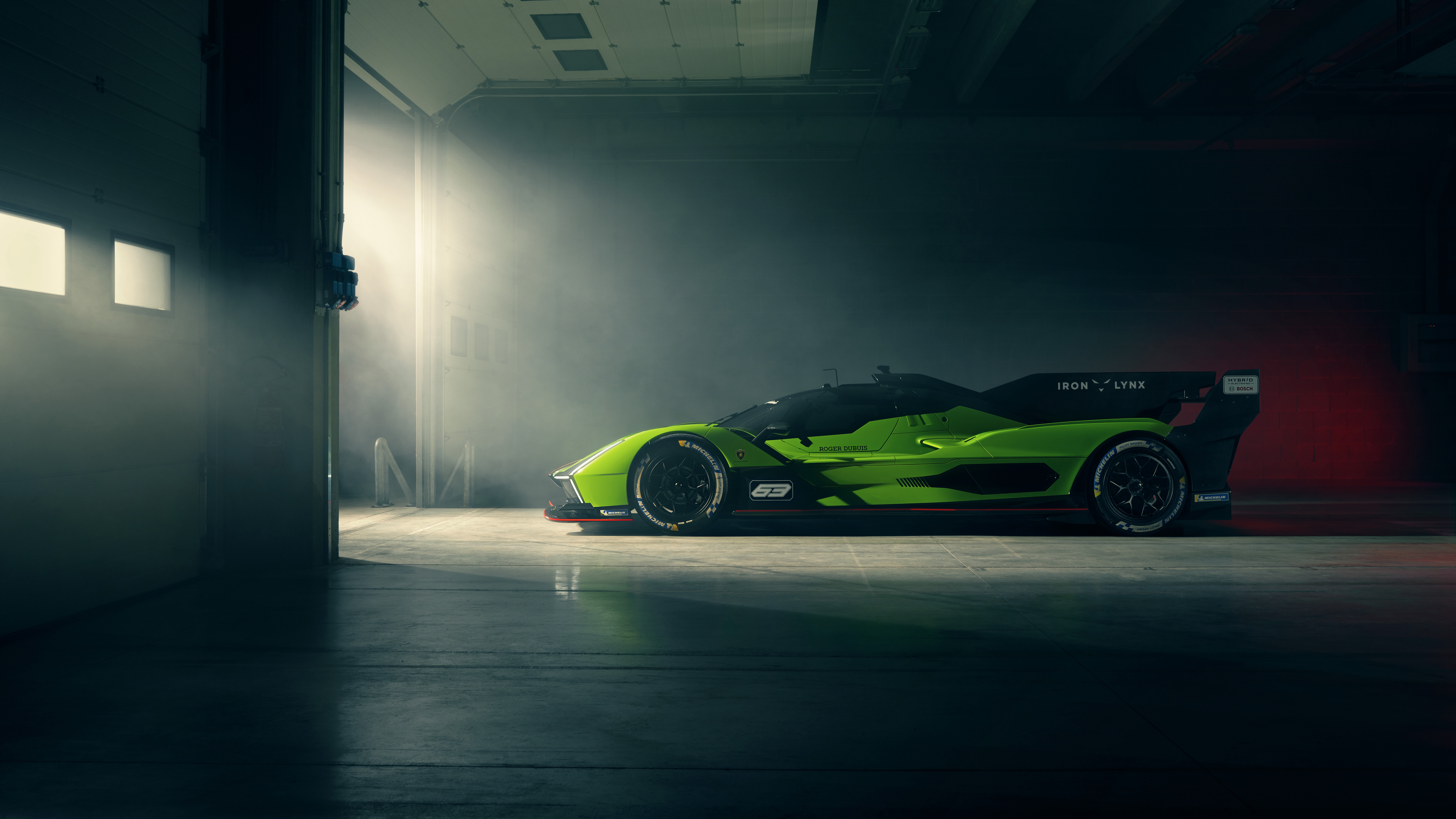 Lamborghini SC63 race car in a garage HD Wallpaper