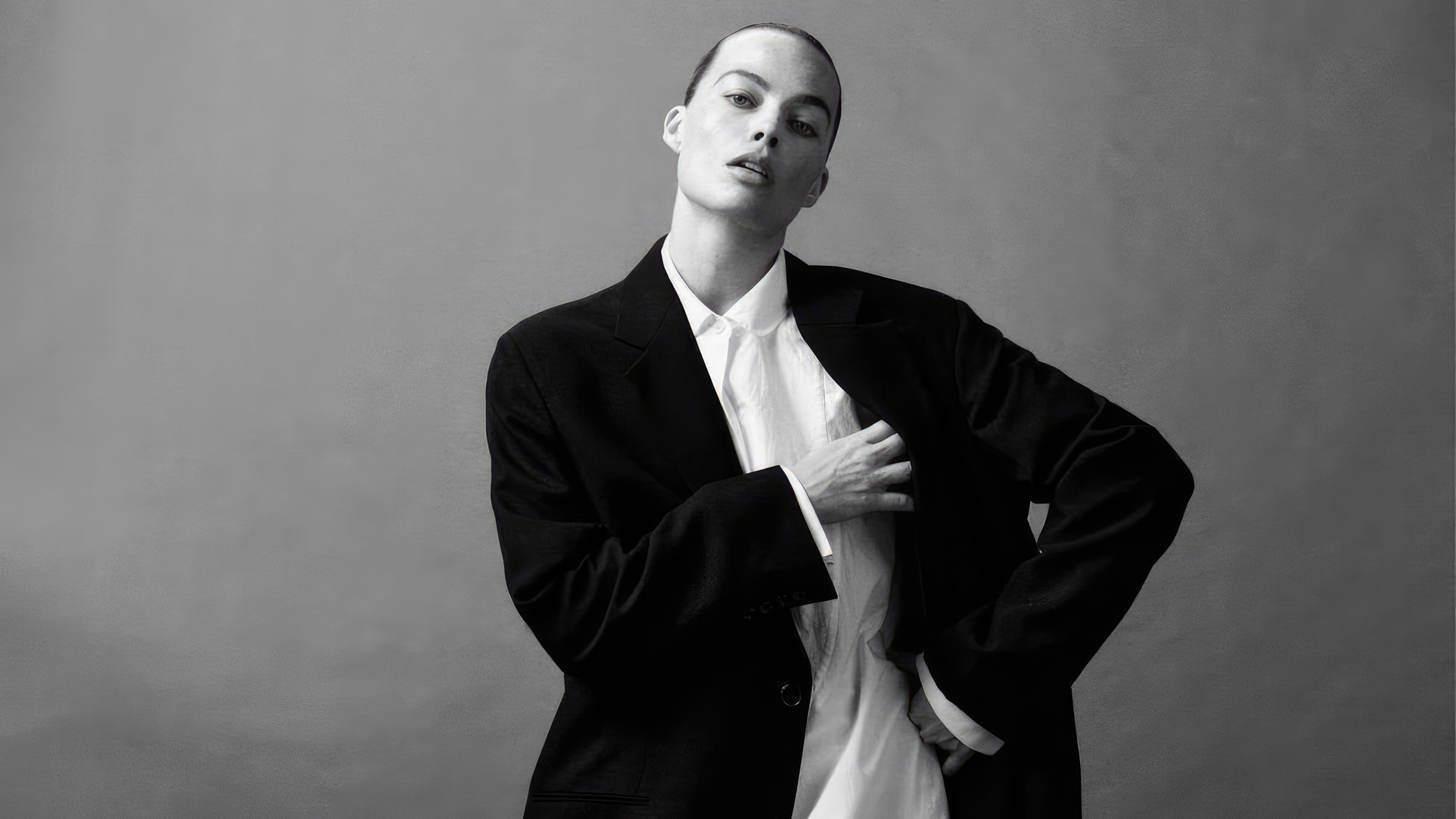 Margot Robbie in a black suit and white shirt HD Wallpaper