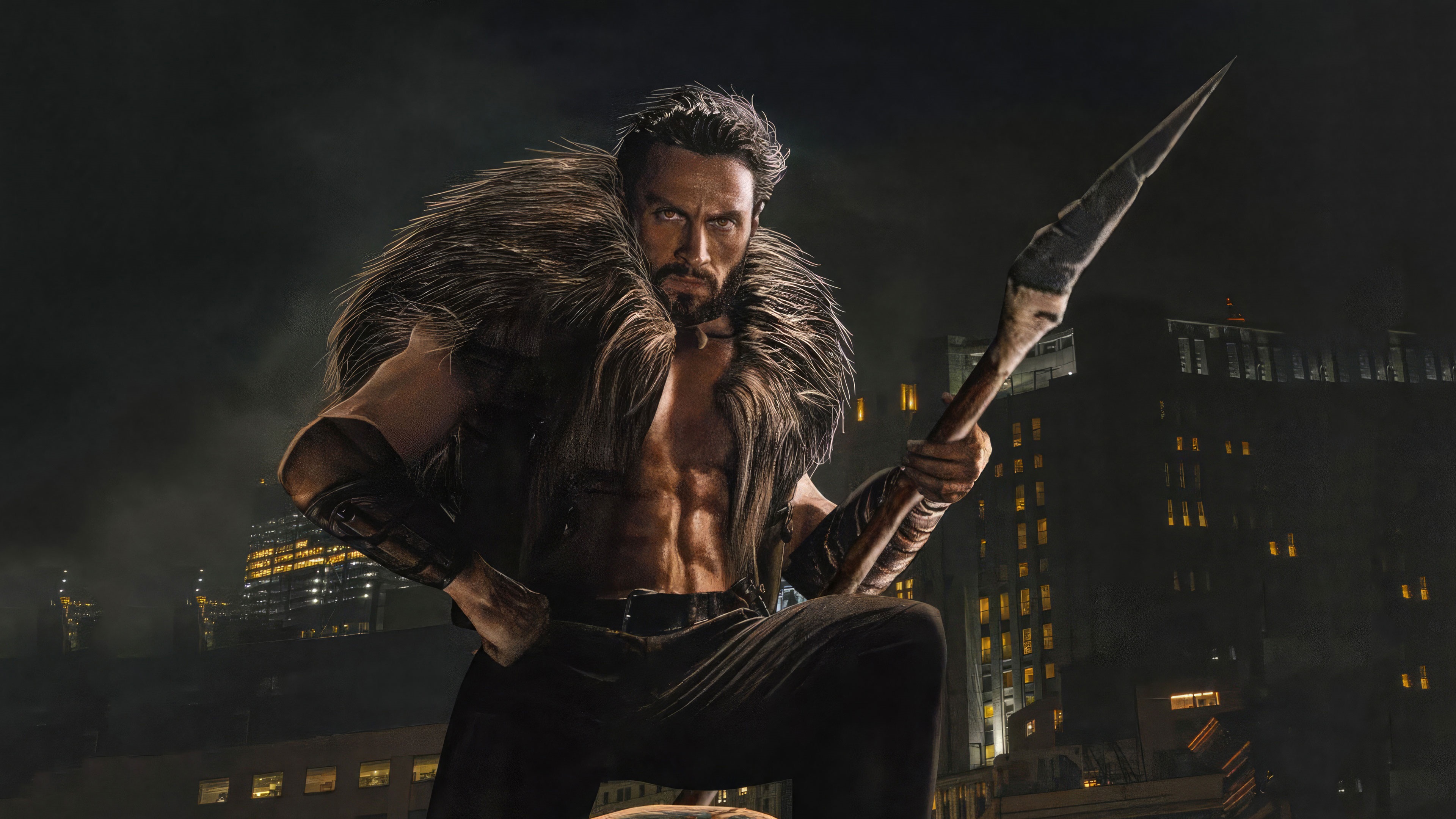 Kraven the Hunter holding a spear in front of city buildings HD Wallpaper
