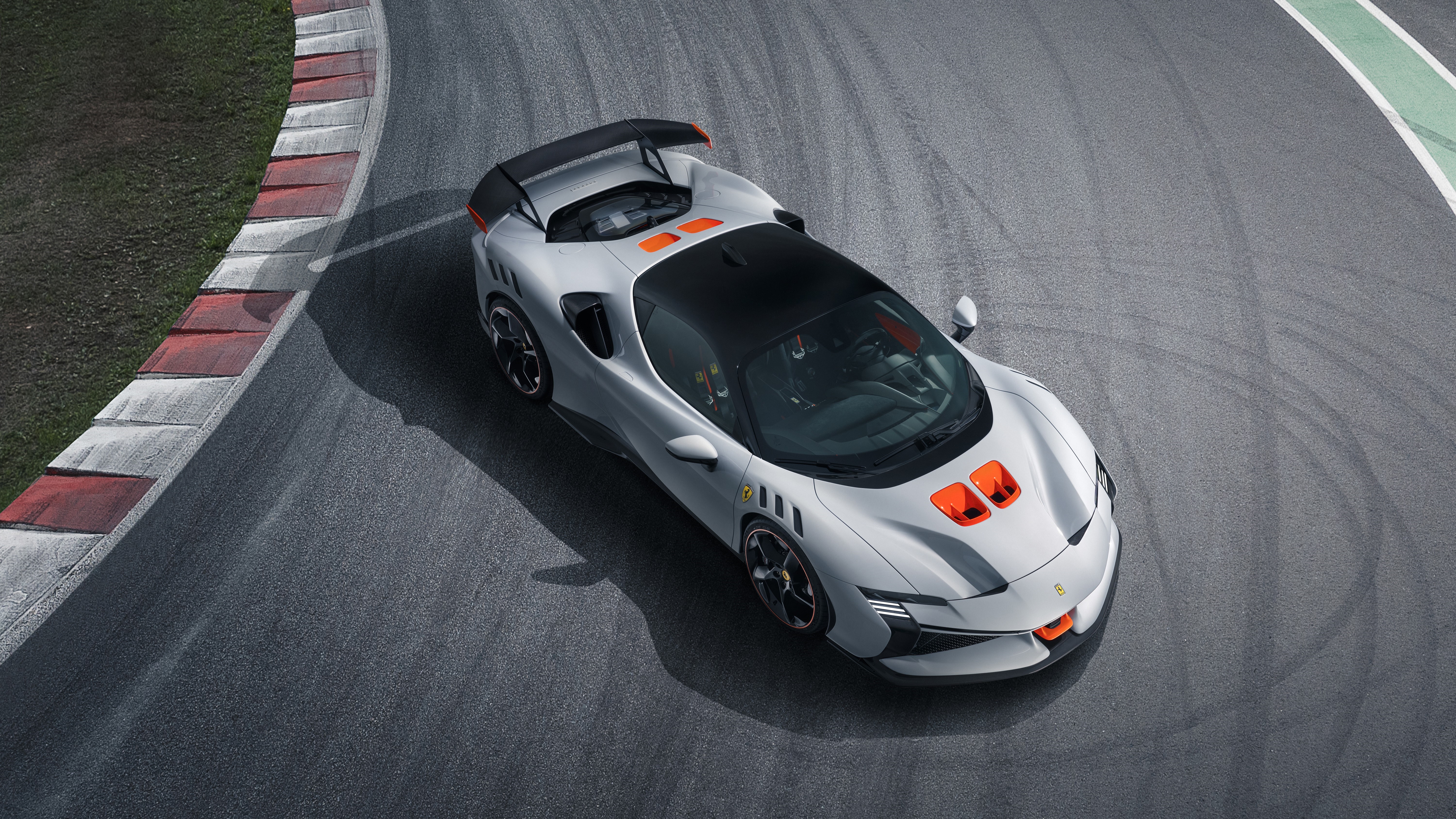 Ferrari SF90 XX Stradale on a race track HD Wallpaper