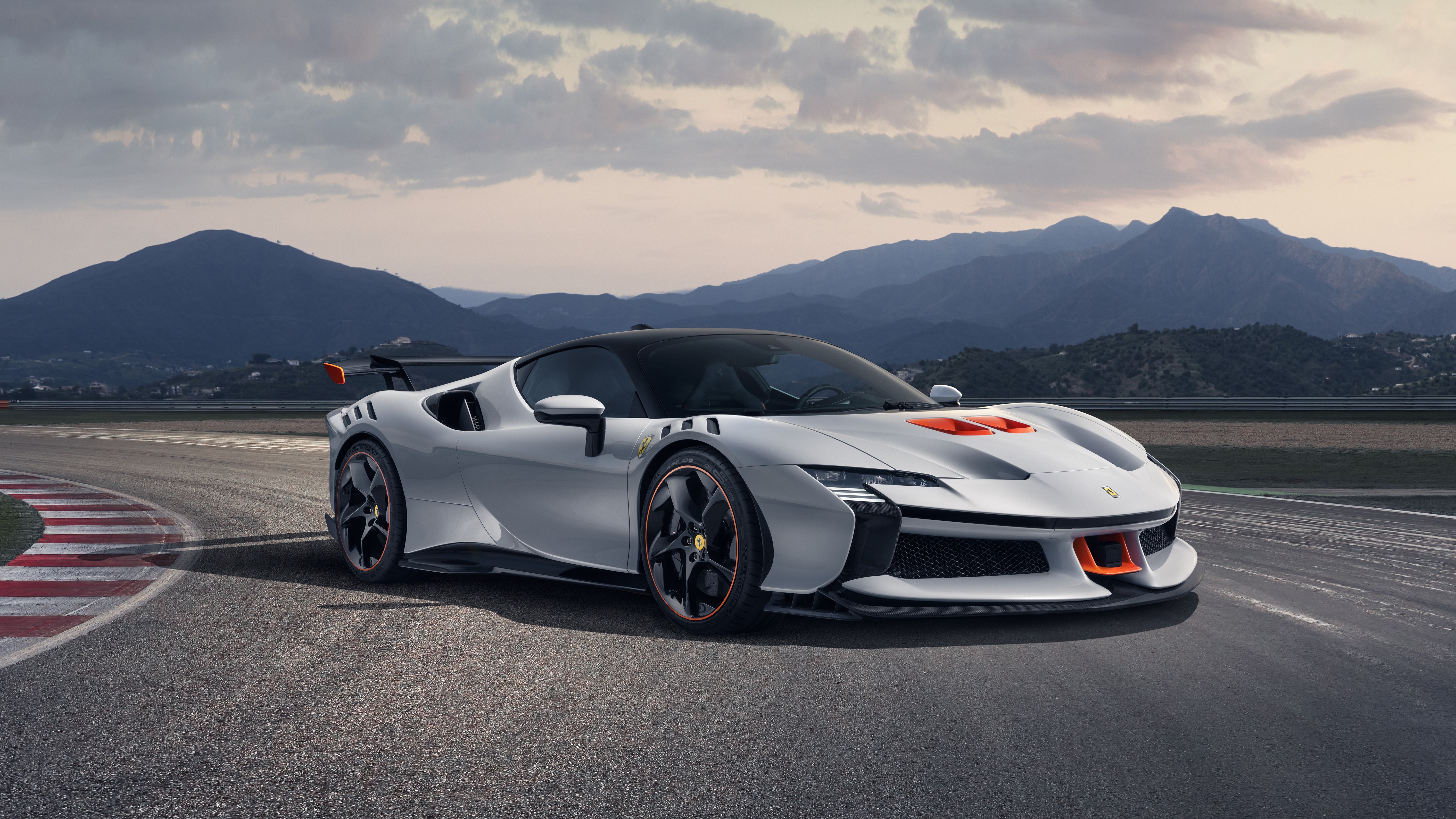 Ferrari SF90 XX Stradale on a race track HD Wallpaper